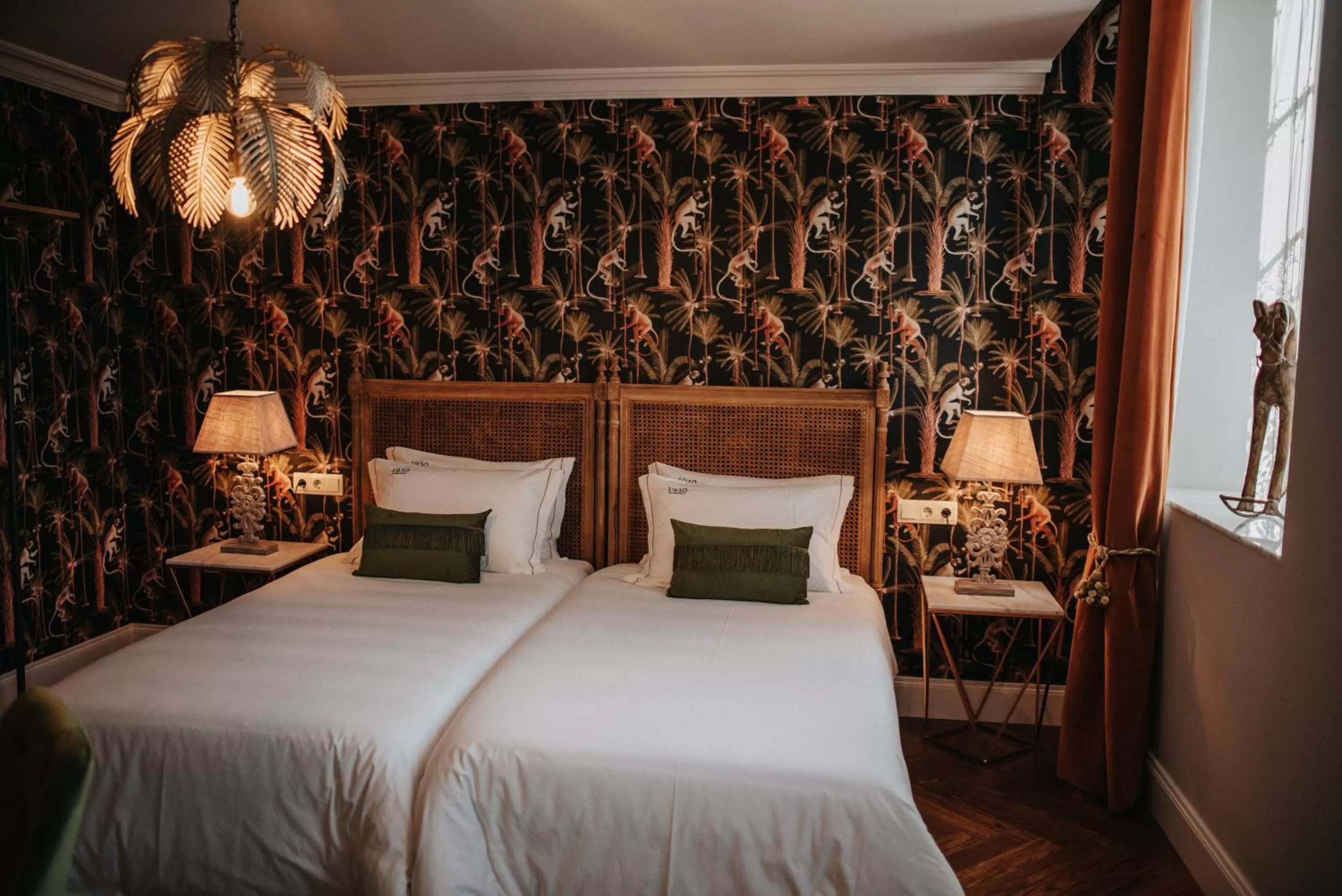 Bed in 1930 Boutique Hotel