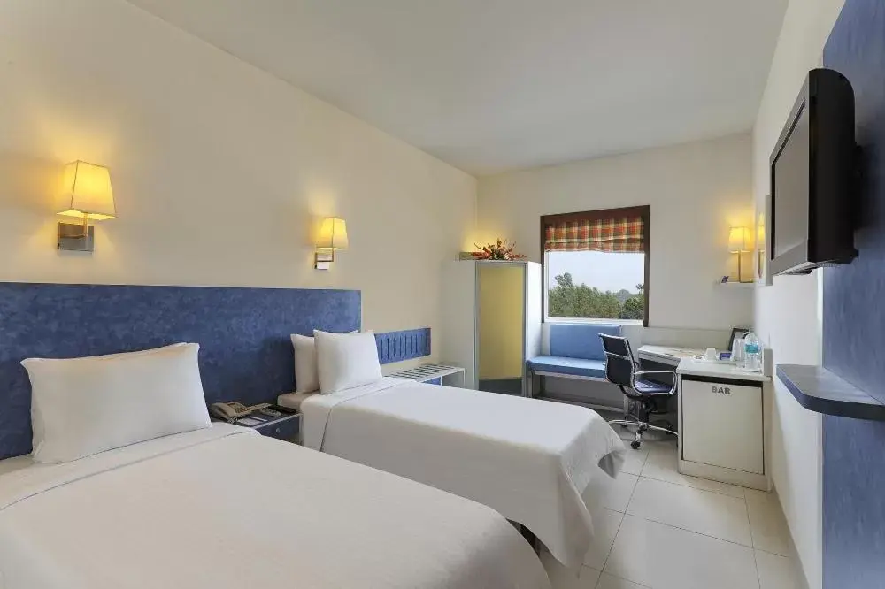 Superior Room 2 Sgl Beds - single occupancy in Hometel Roorkee Superior Room 2 Sgl Beds - single occupancy in Hometel Roorkee