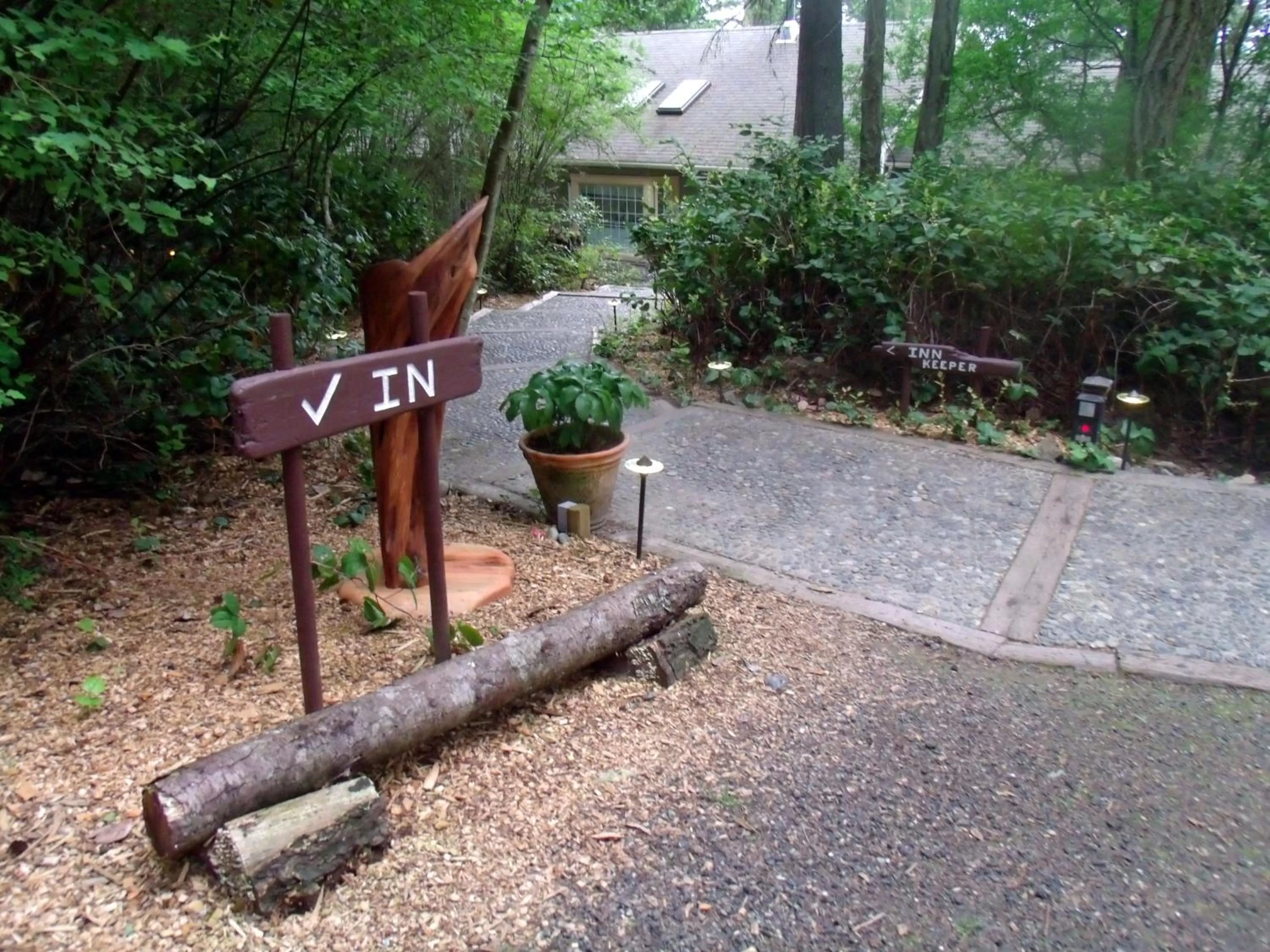 Property logo or sign in Inn to the Woods