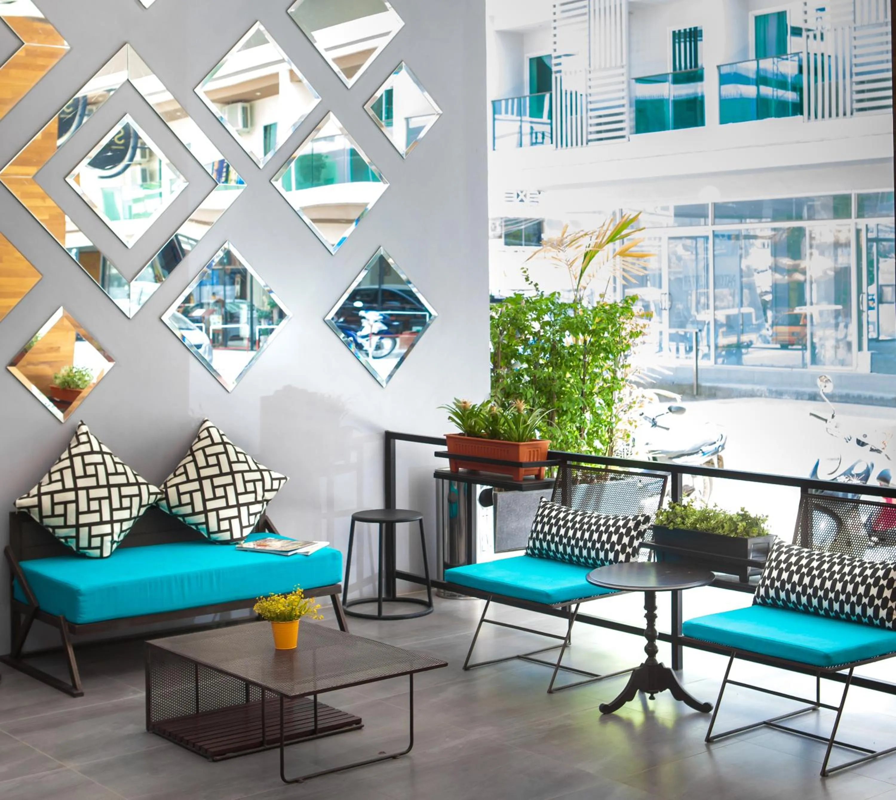 Communal lounge/ TV room in The Crib Patong - SHA Certified