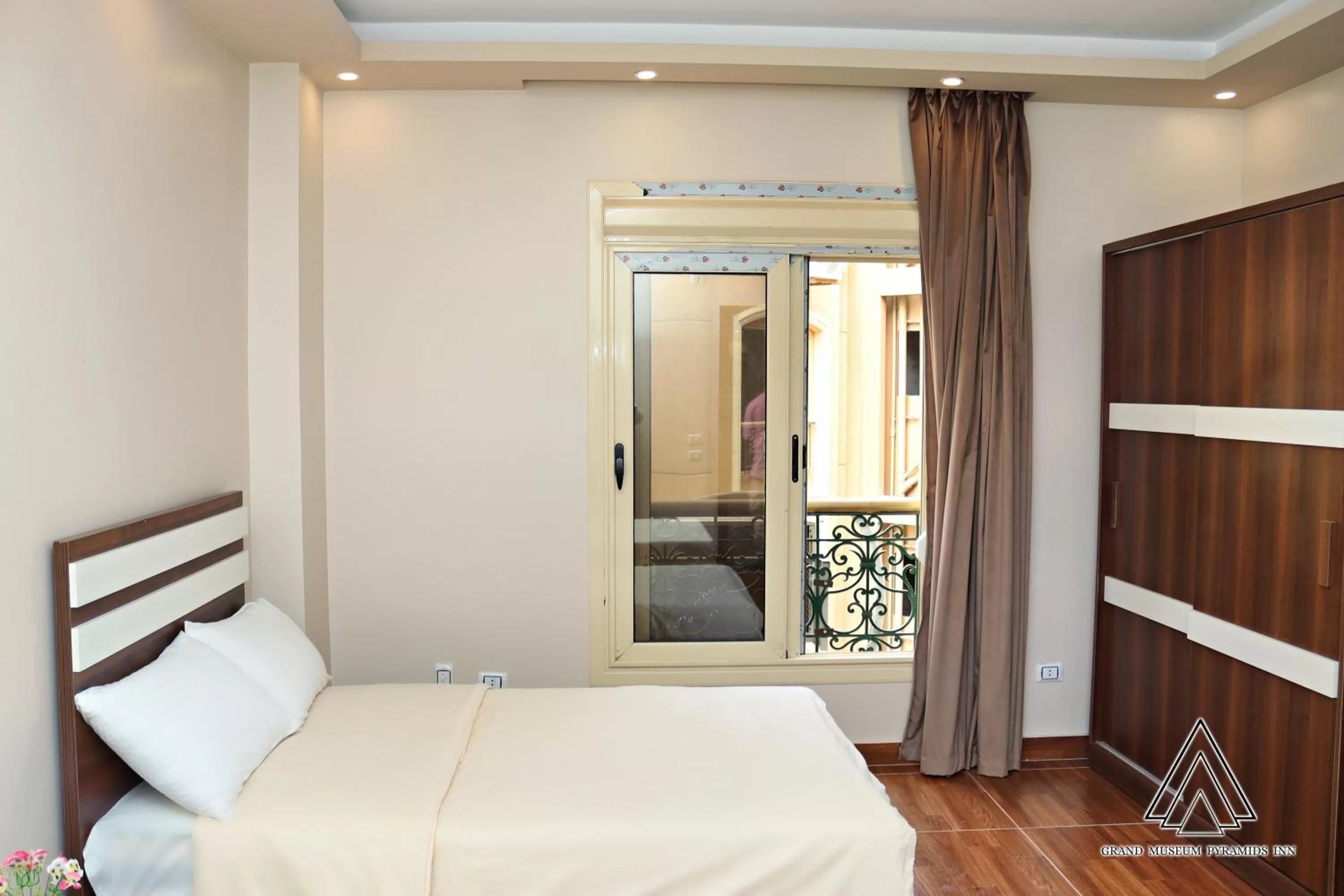 Bed in Grand Museum Pyramids Inn