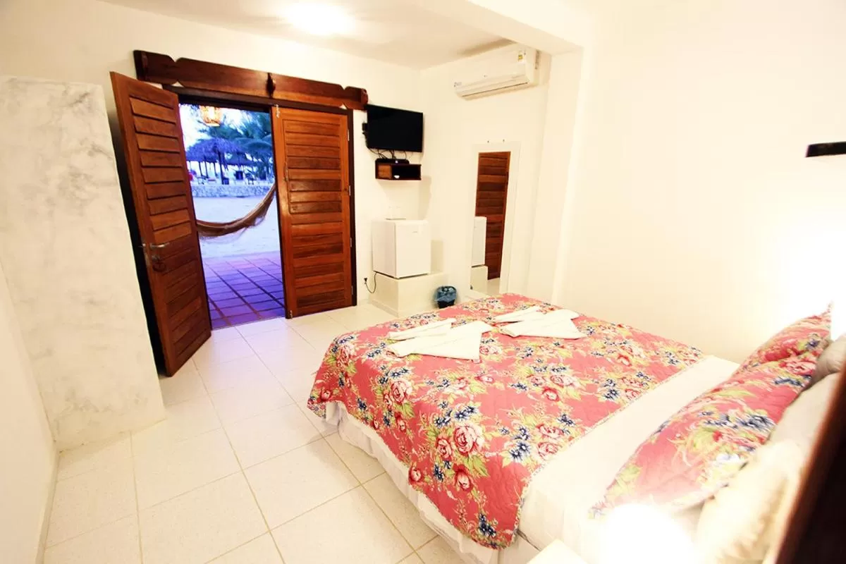 Photo of the whole room, Bed in Pousada Recanto da Praia