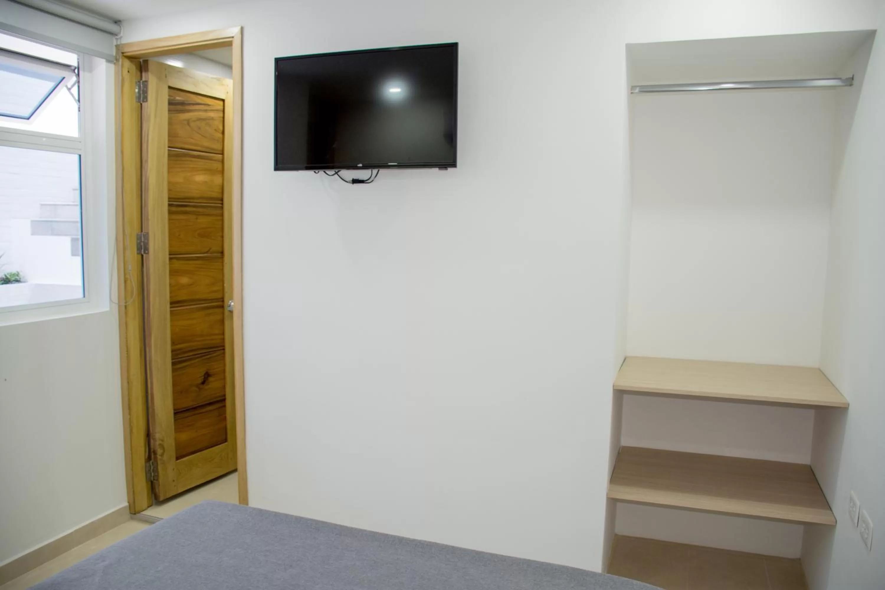 Bathroom, TV/Entertainment Center in Stanza Hotel Monteria