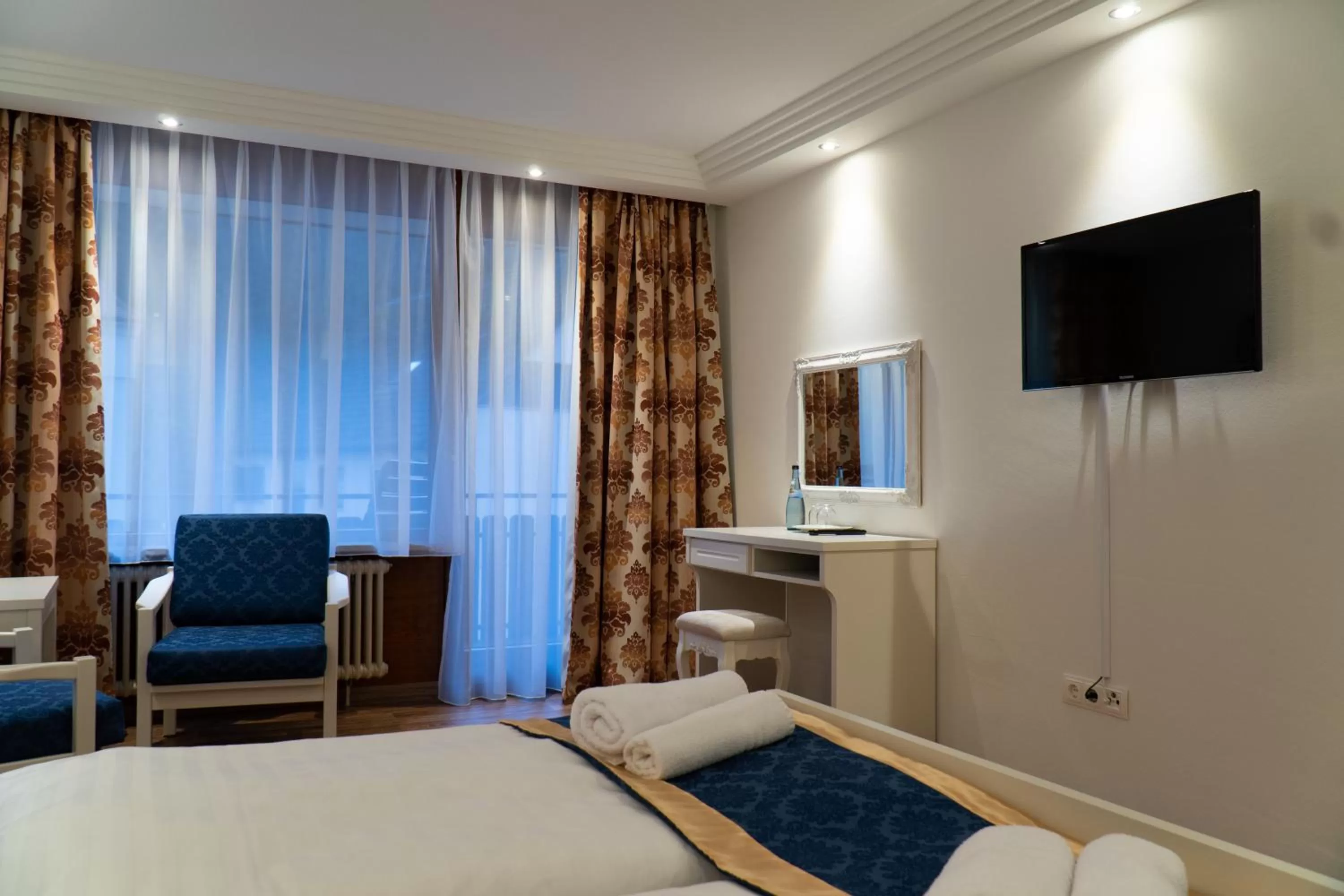 Photo of the whole room, TV/Entertainment Center in Hotel Eleon