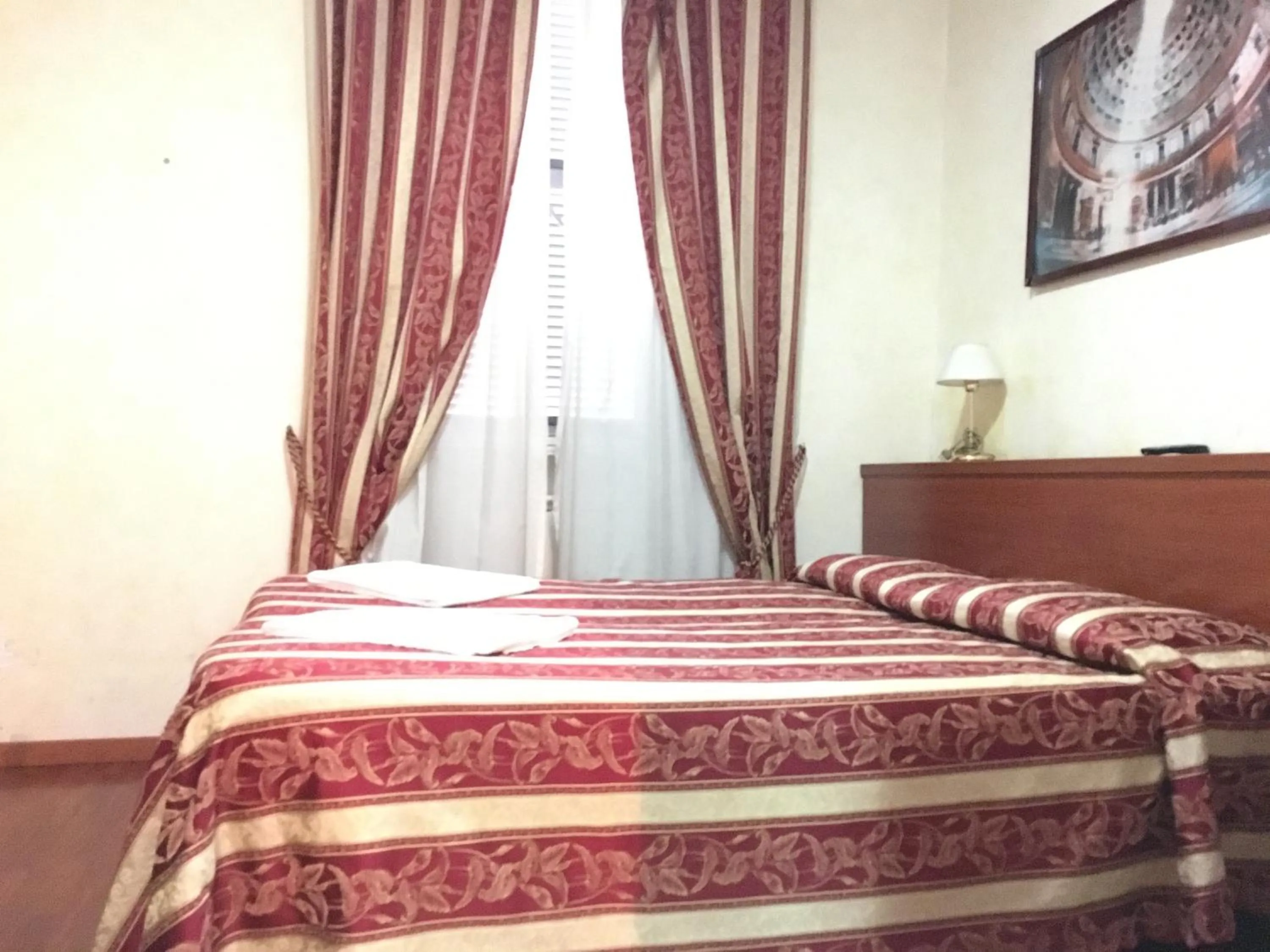 Decorative detail, Bed in Toffa Place In Rome