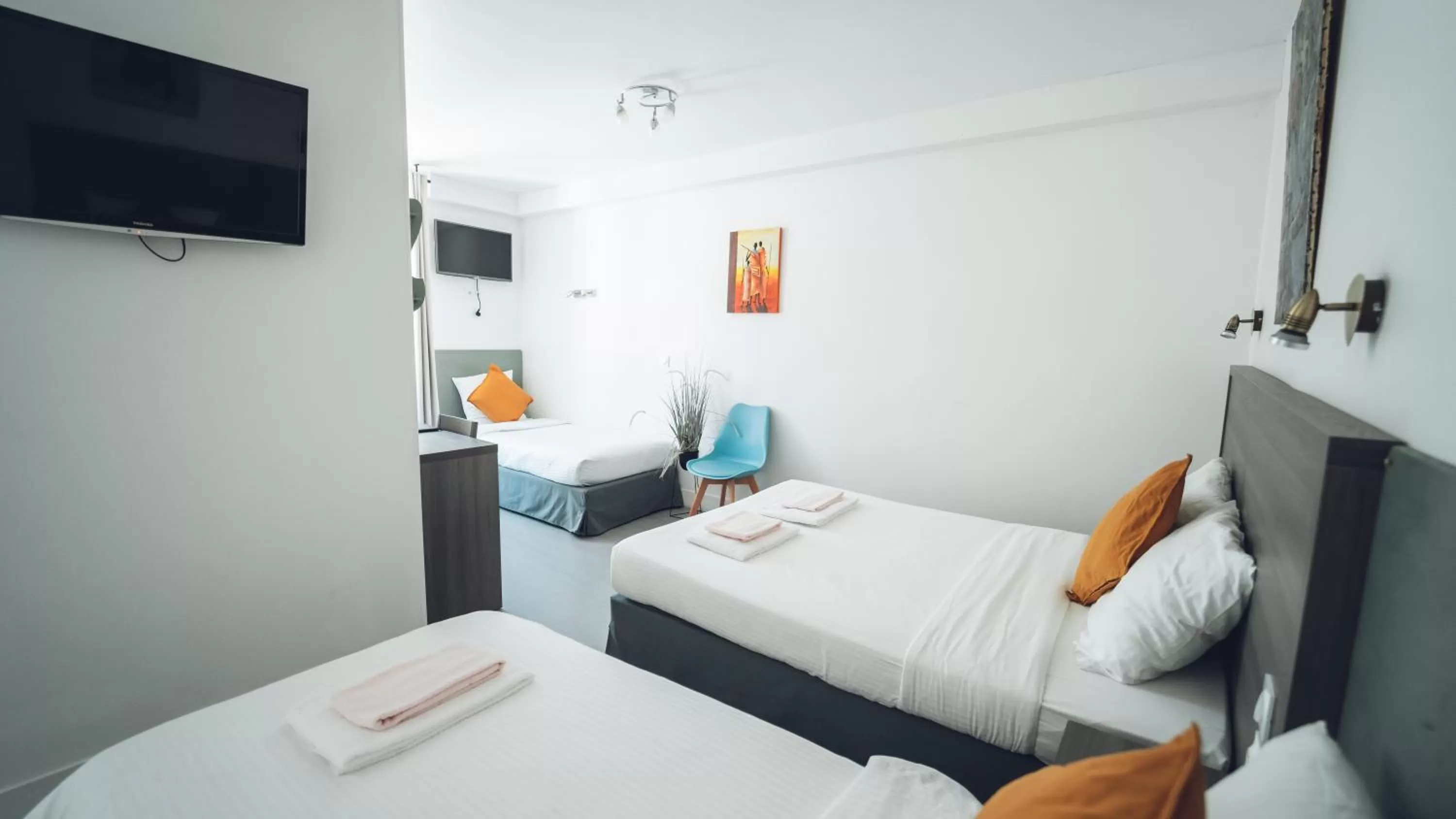 Bed in Logis Hôtel Vuillot