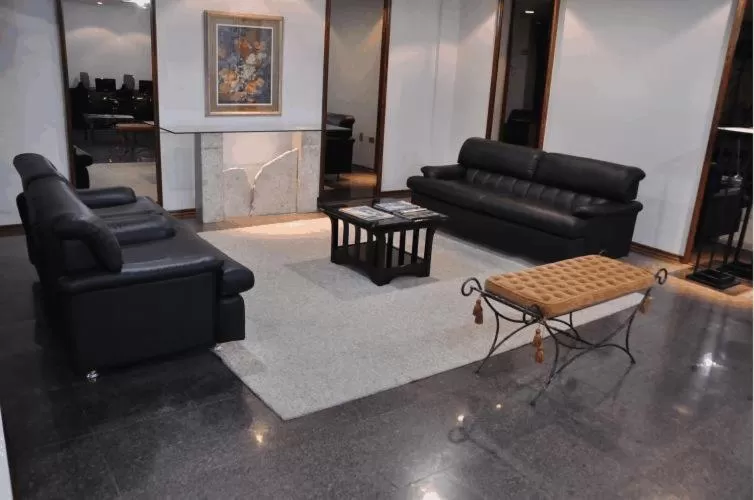 Communal lounge/ TV room, Seating Area in Cardum Hotel