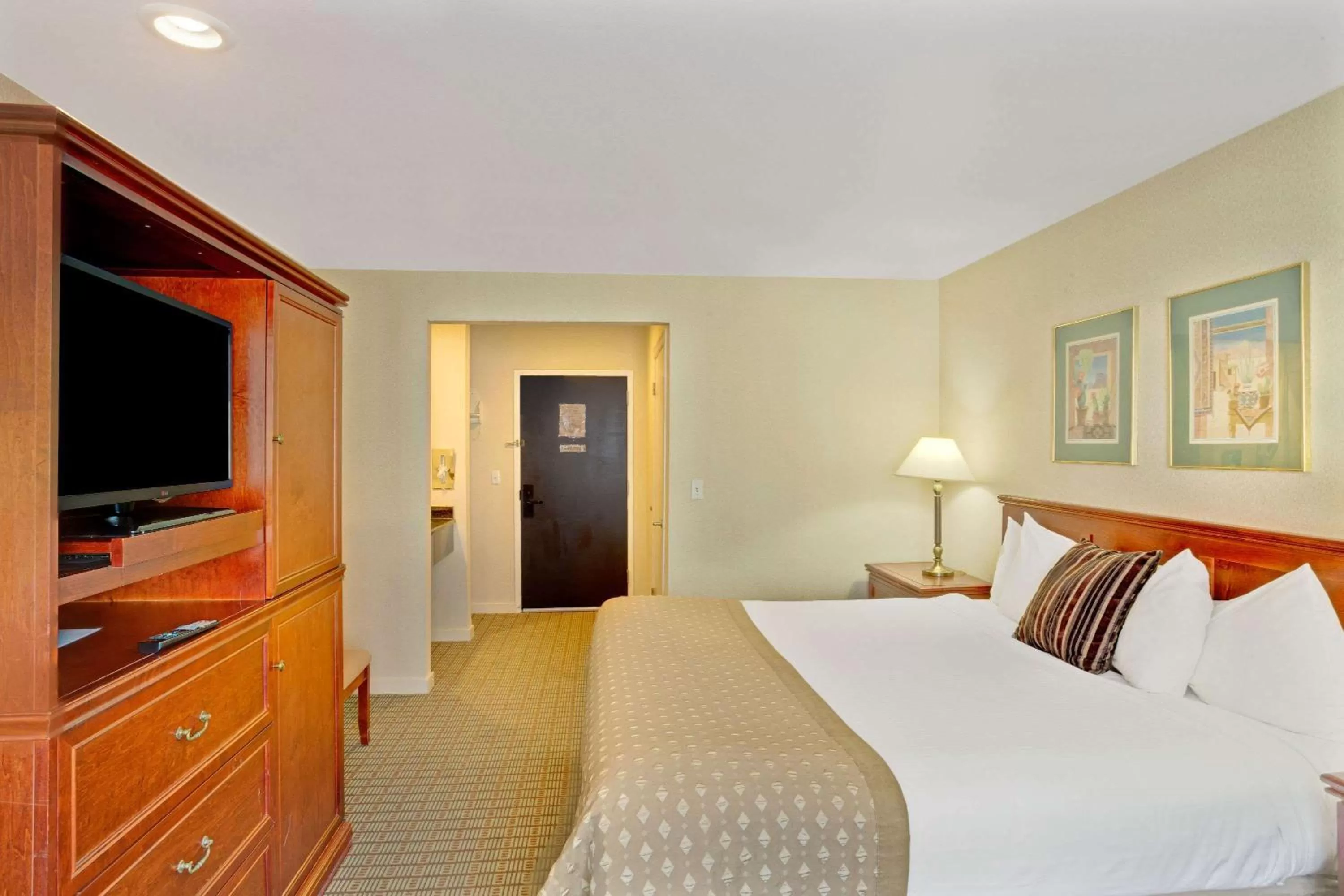 Photo of the whole room, Bed in Ramada by Wyndham Draper, Utah
