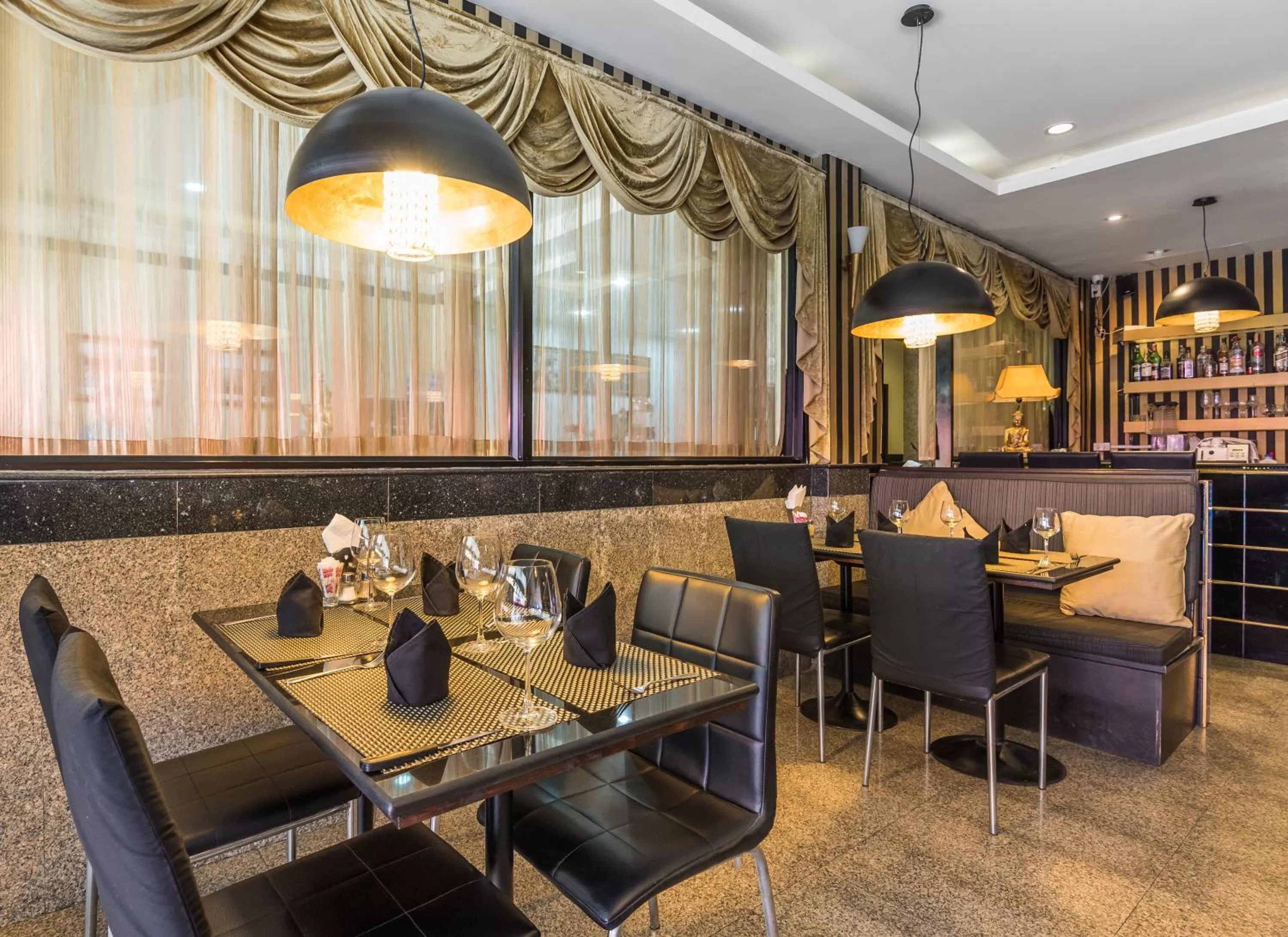 Restaurant/places to eat in The Ambiance Hotel