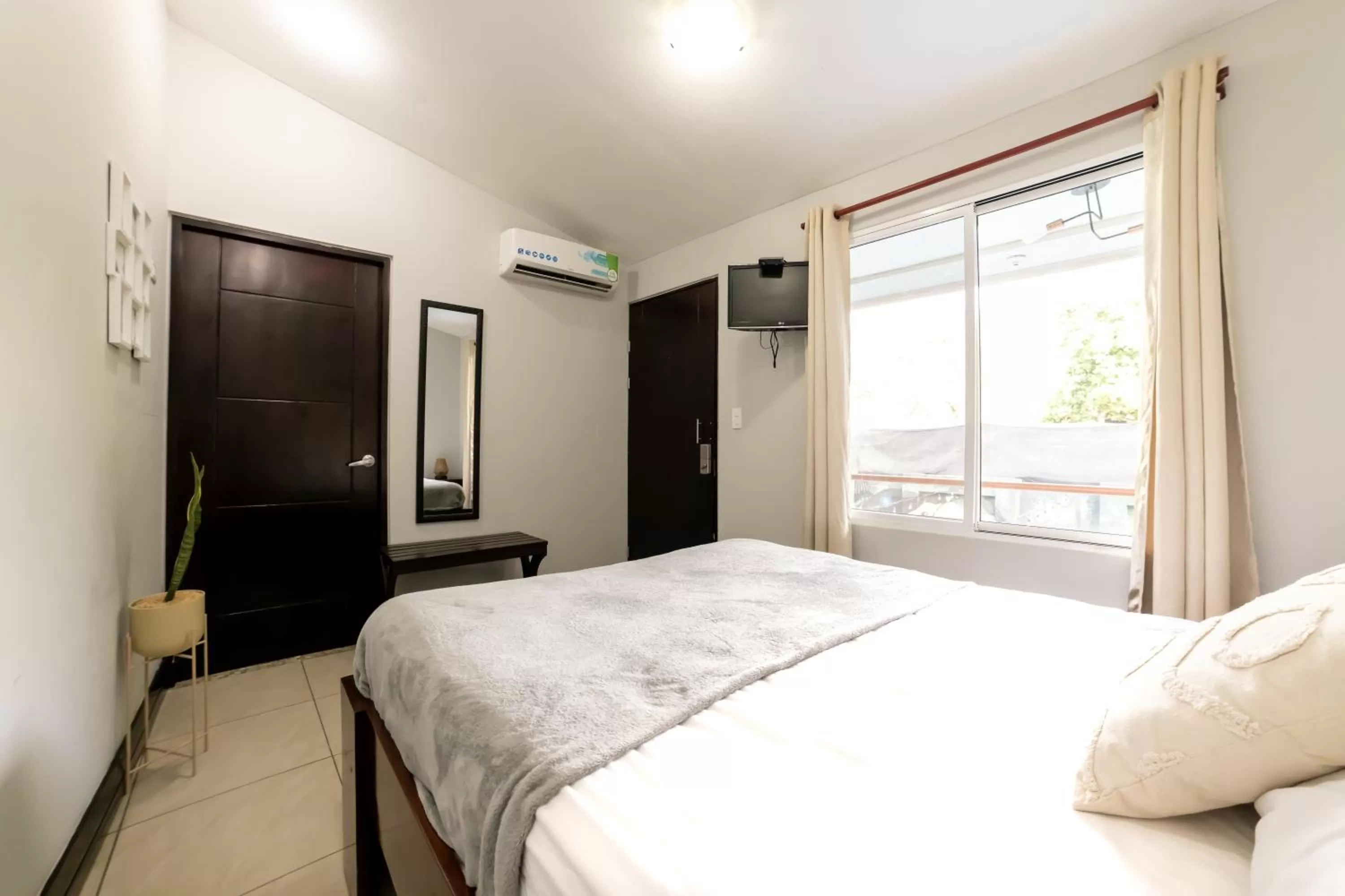 Bed in Encanto Del Mar Hotel