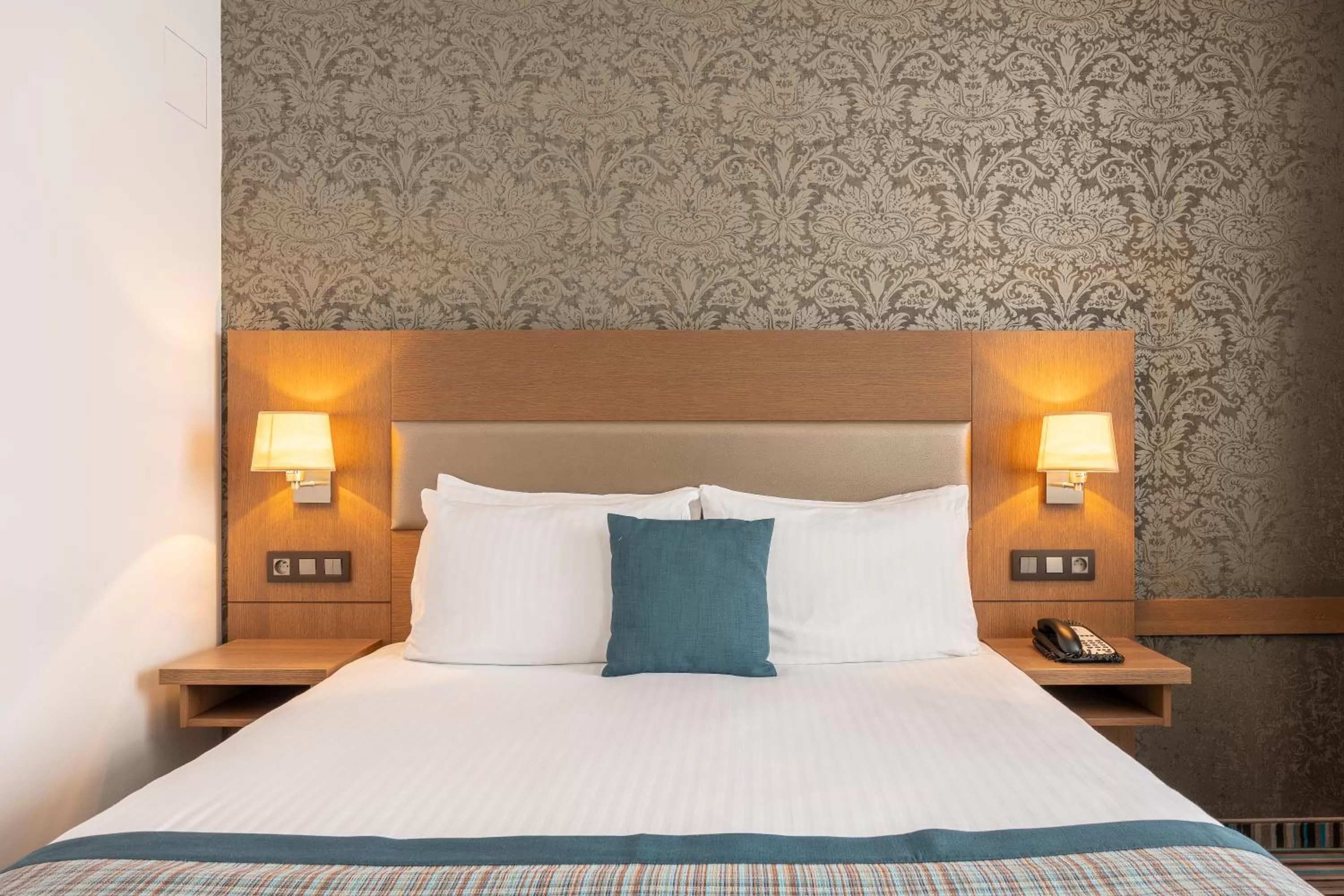 Bed in Leopold Hotel Oudenaarde