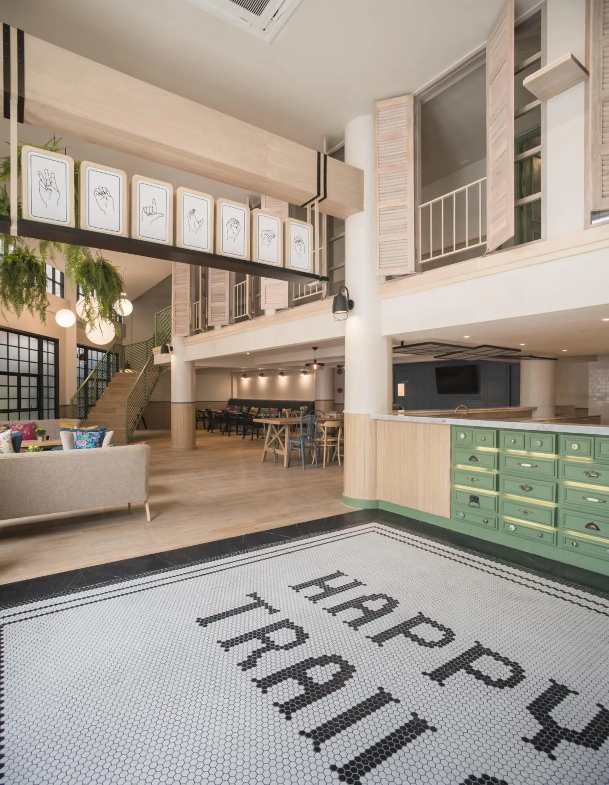 Communal lounge/ TV room in The Blanket Hotel Phuket Old Town