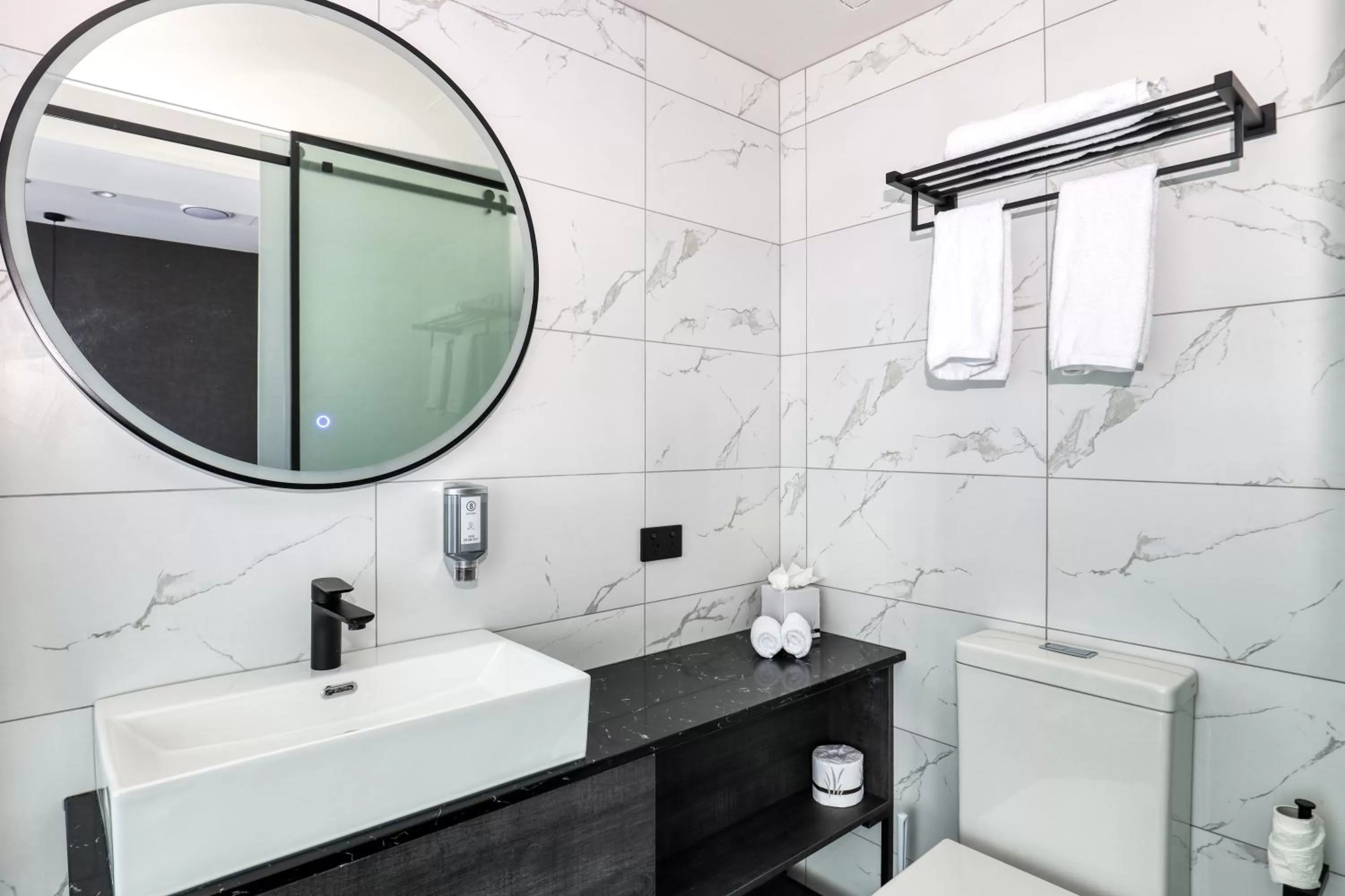 Toilet in Microtel by Wyndham Wellington