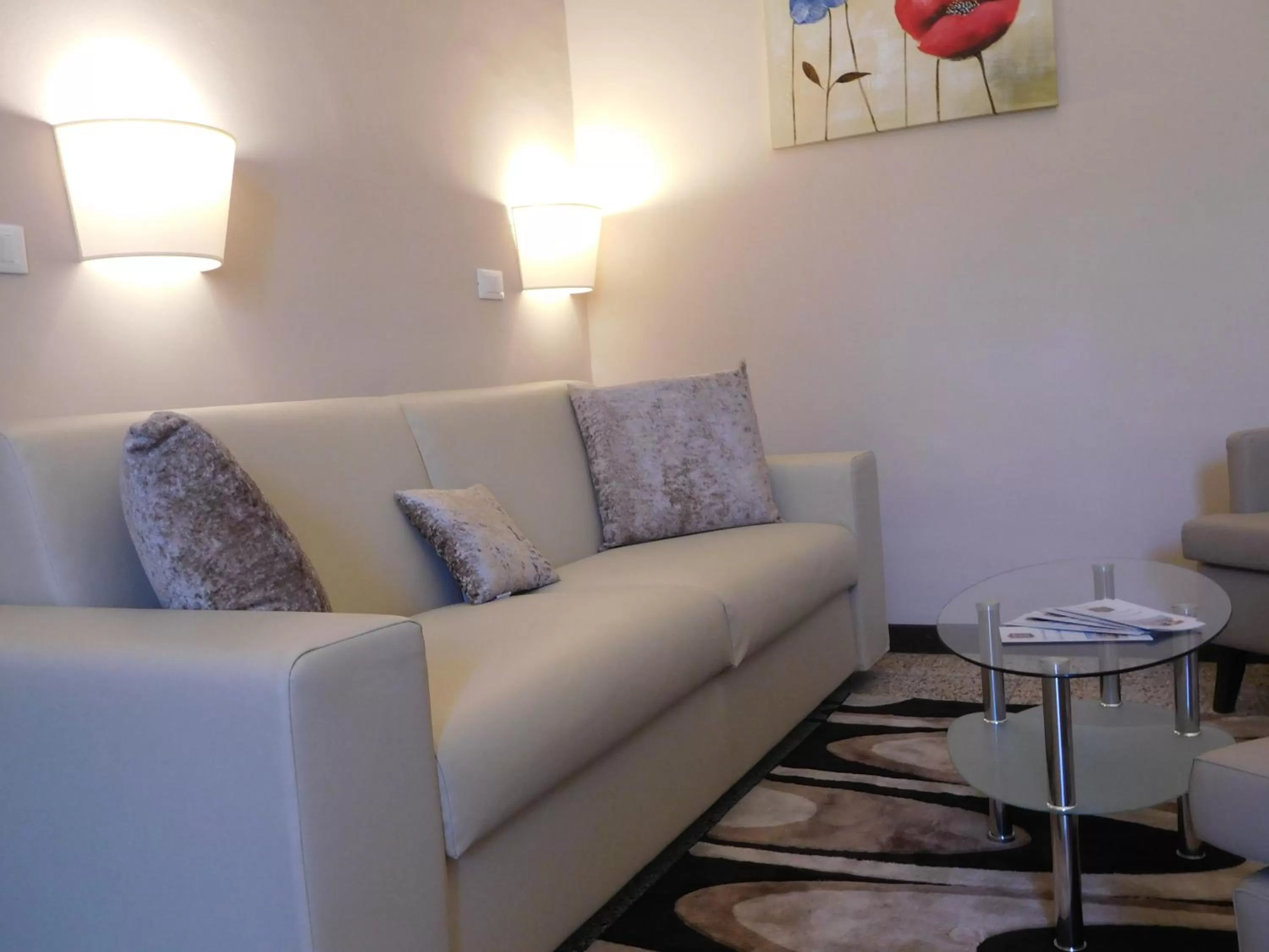 Living room in Moonlight Hotel&Suites