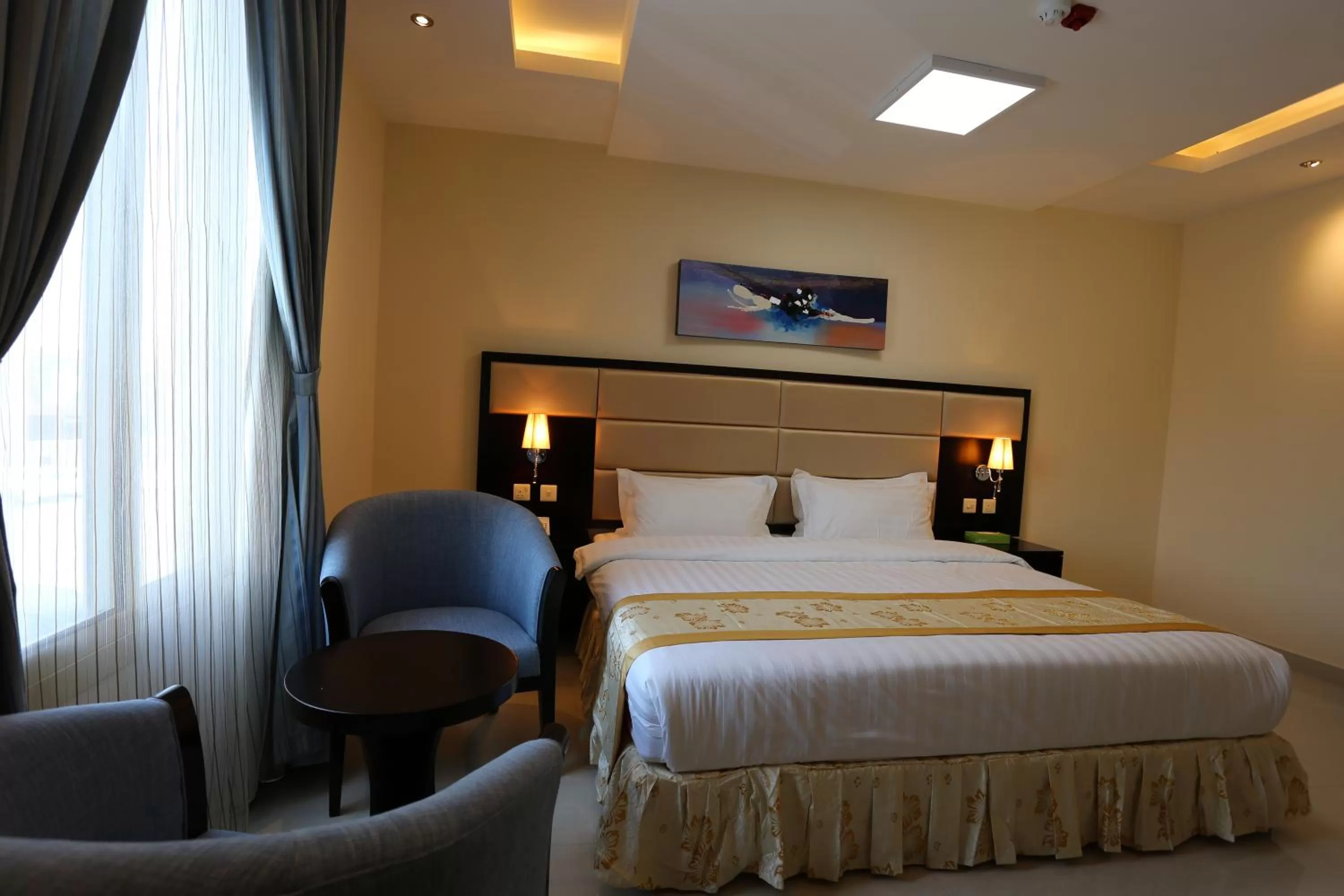 Bed in Arjaan Altakhassusi Hotel Suites