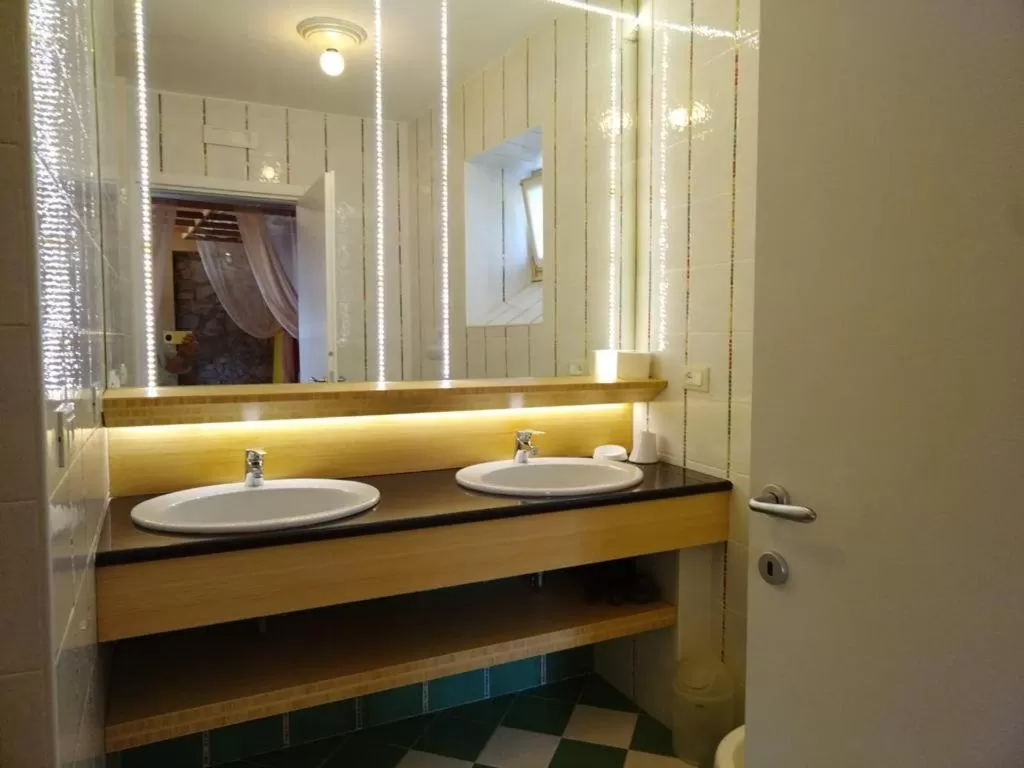 Bathroom in Borgo al Sole by Garda Facilities