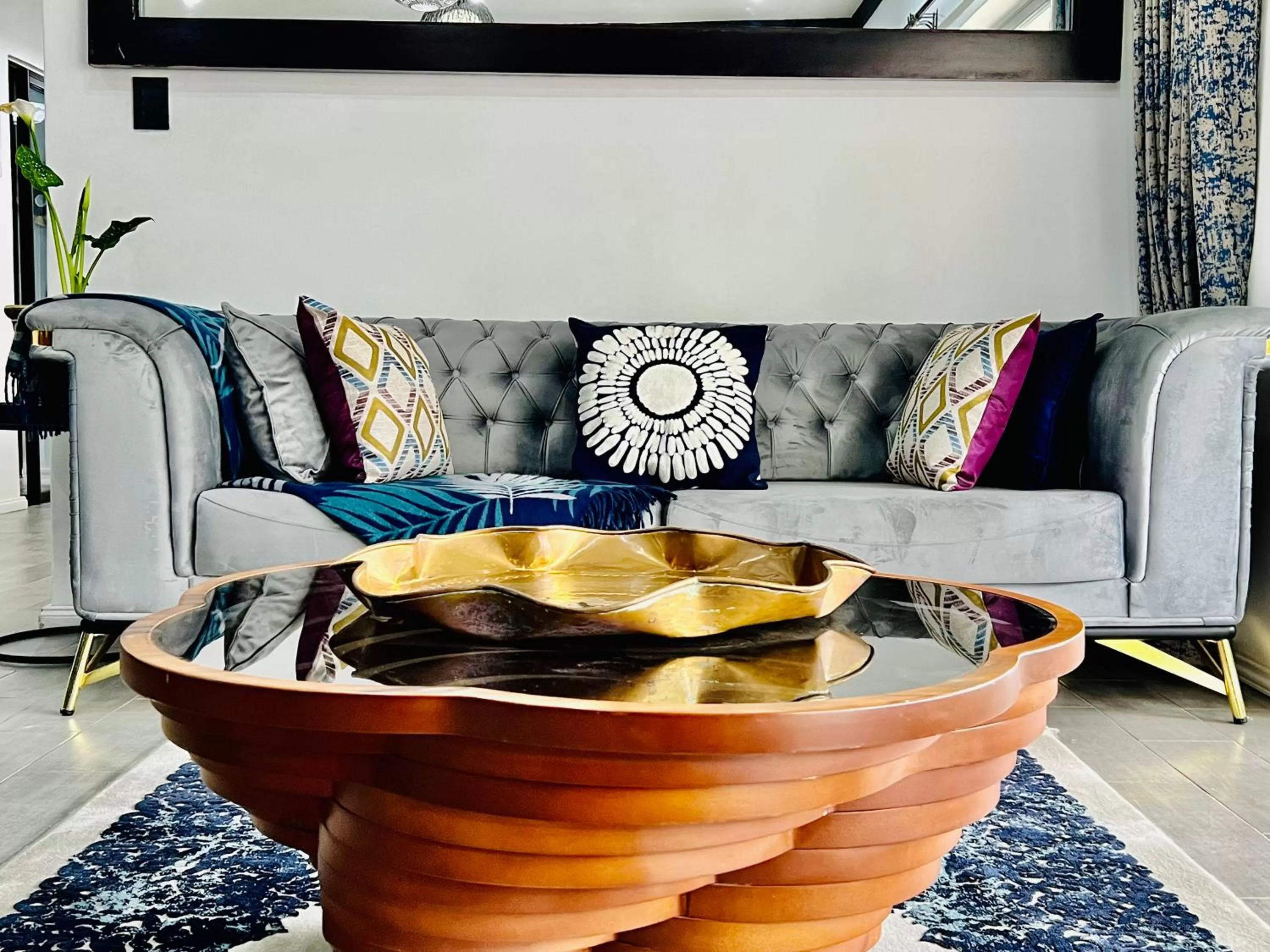 Seating area in 24 On Basil Inventive suites