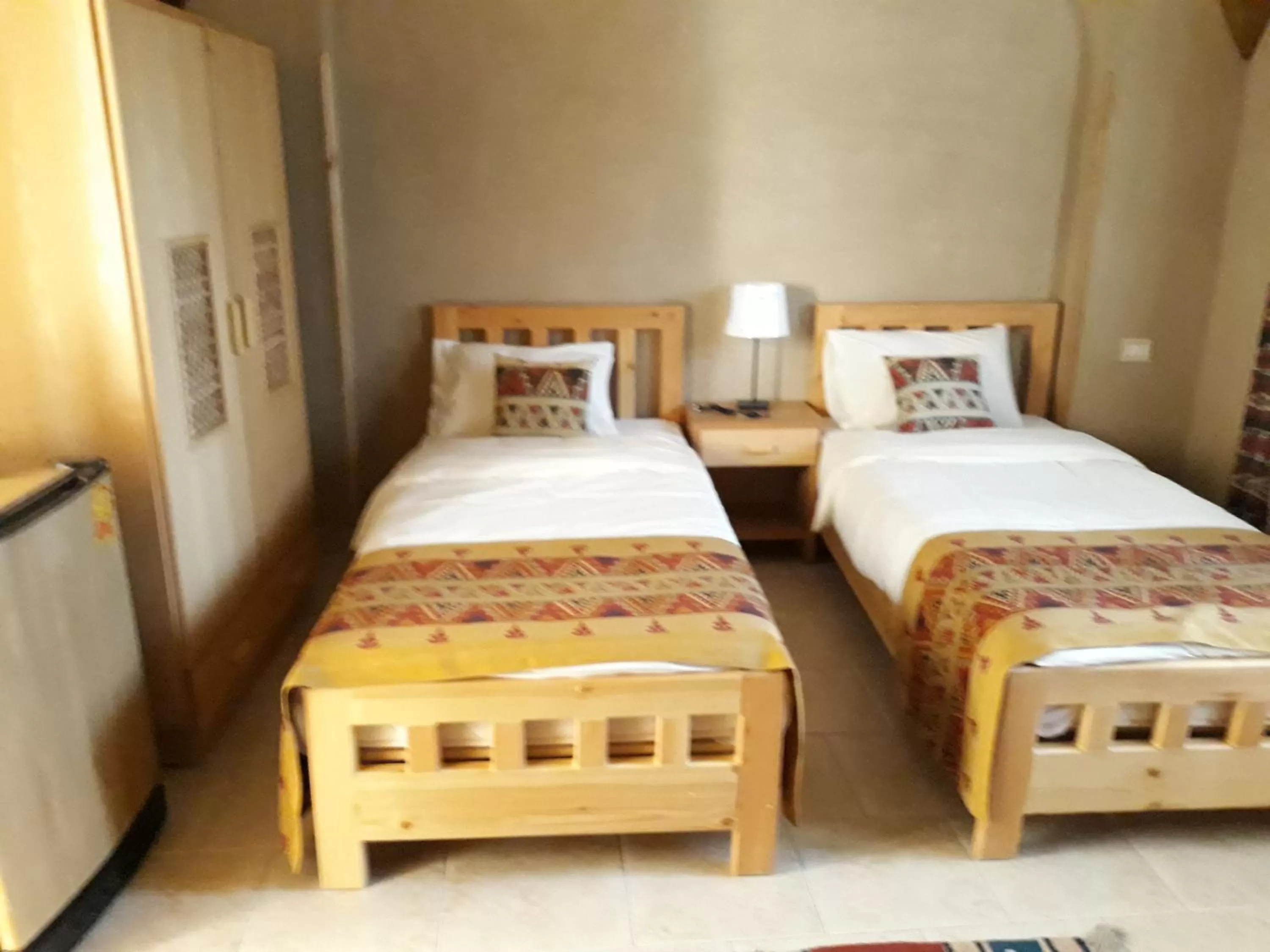 Bed in Embrace Hotel