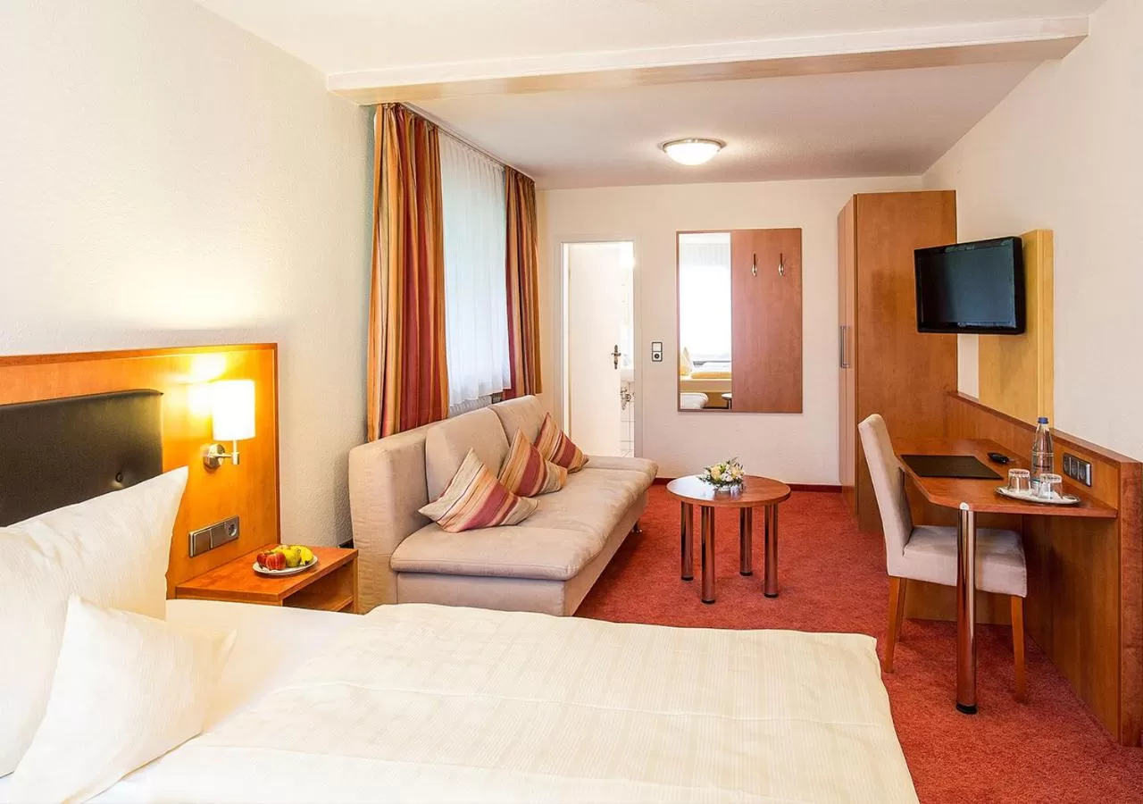 Photo of the whole room, TV/Entertainment Center in Portens Hotel Fernblick