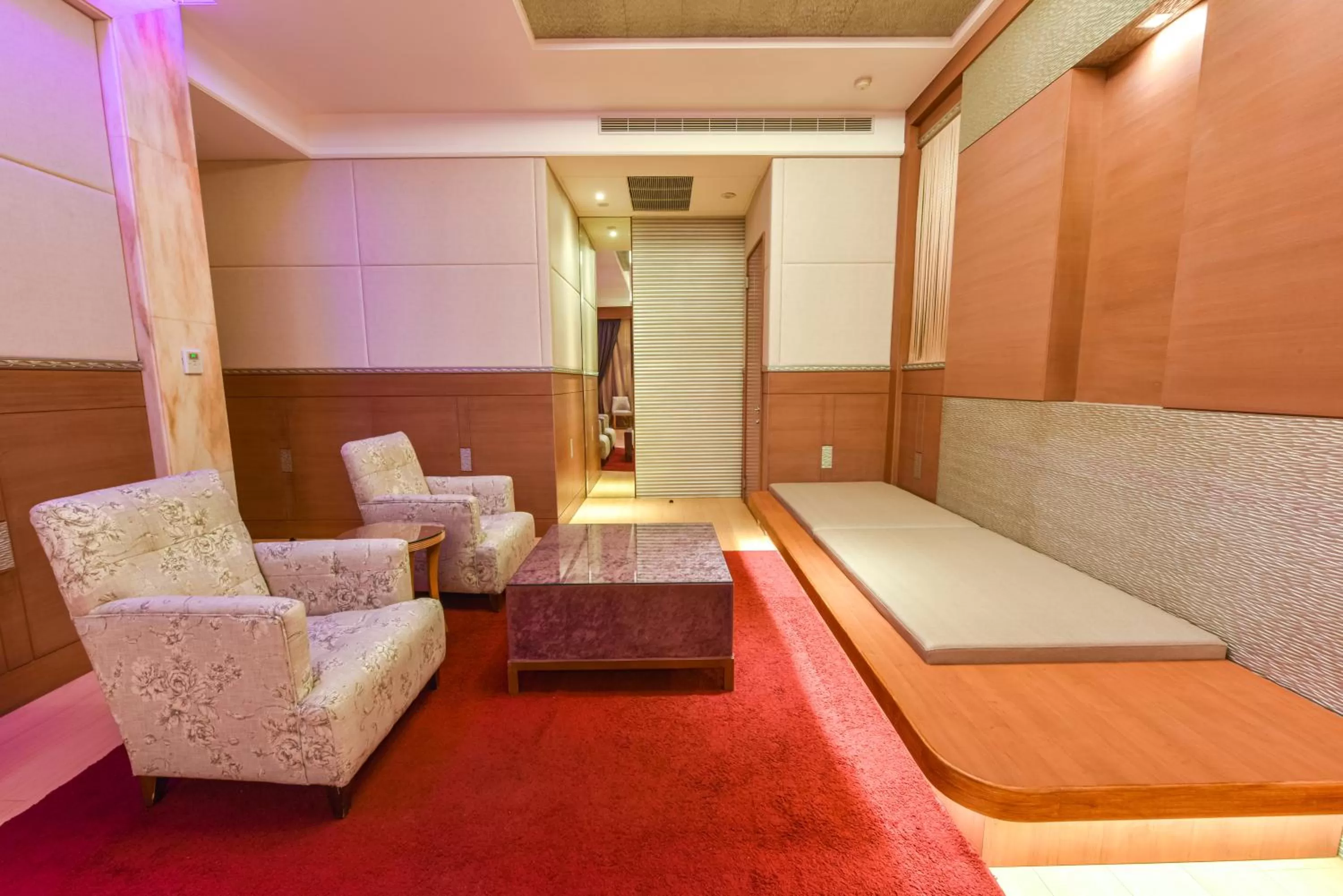 Seating Area in Purple Garden Motel