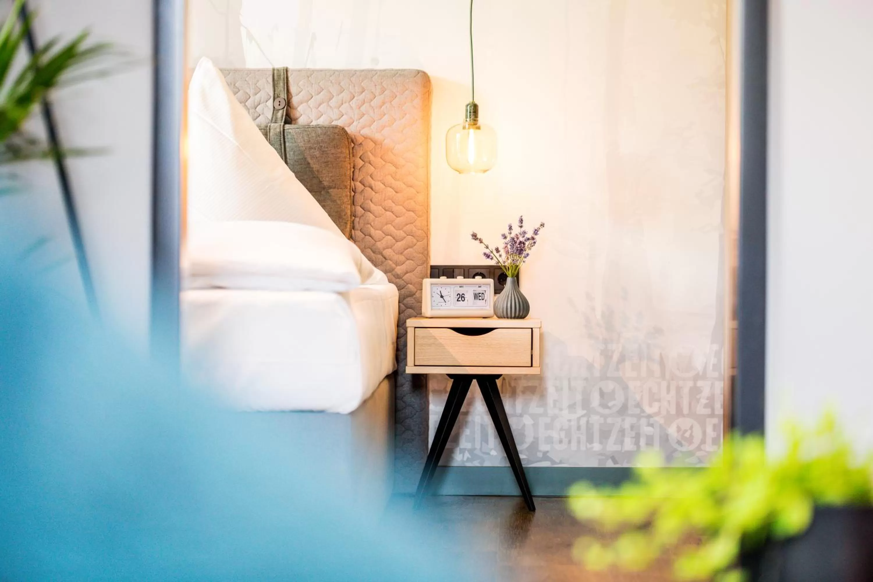 Bed, Seating Area in EchtZeit - Dein Hotelquartier