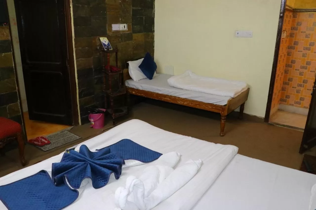 Bed in The Maurvi Inn