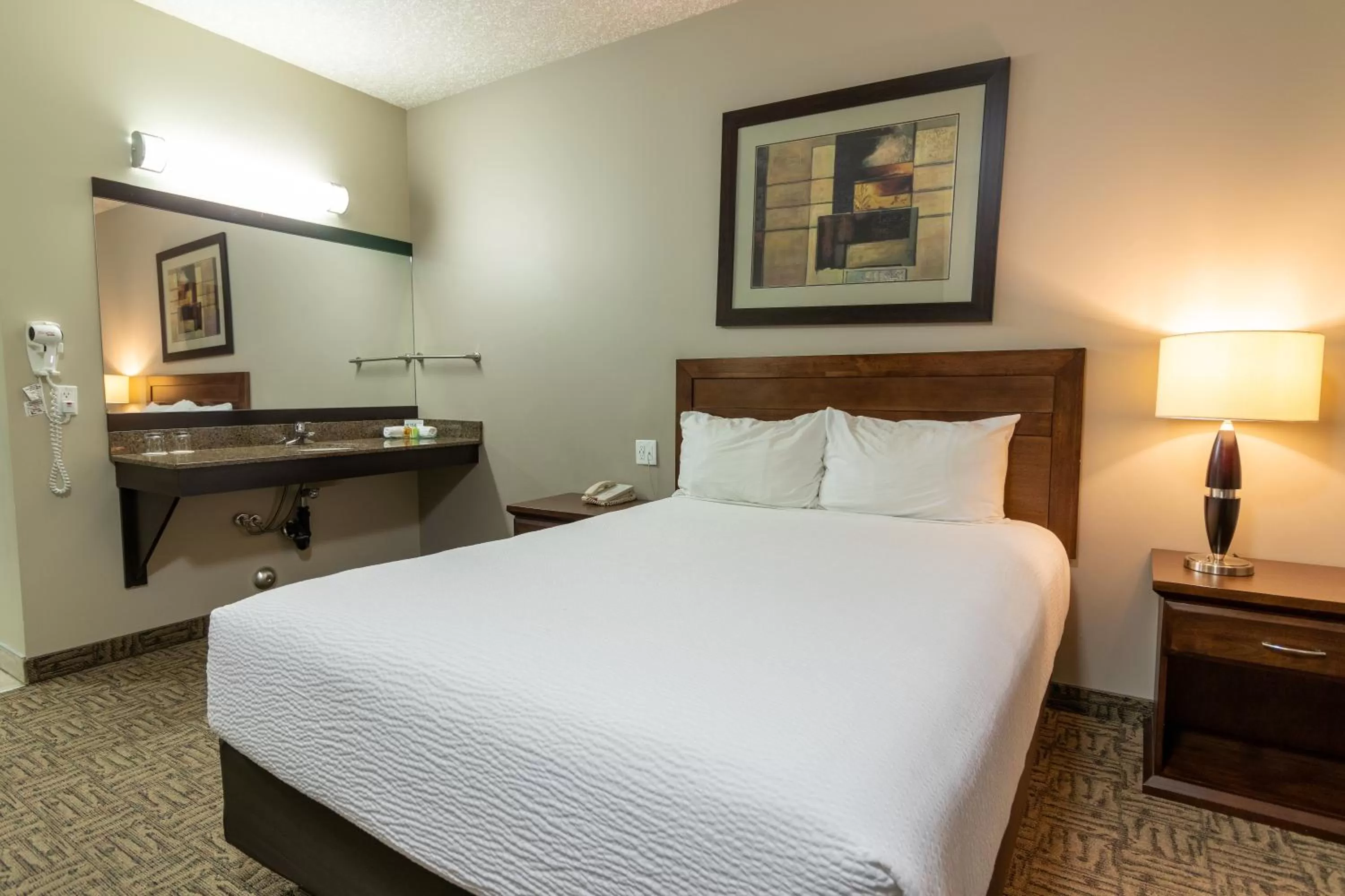 Bedroom, Bed in BCMInns - Lac La Biche