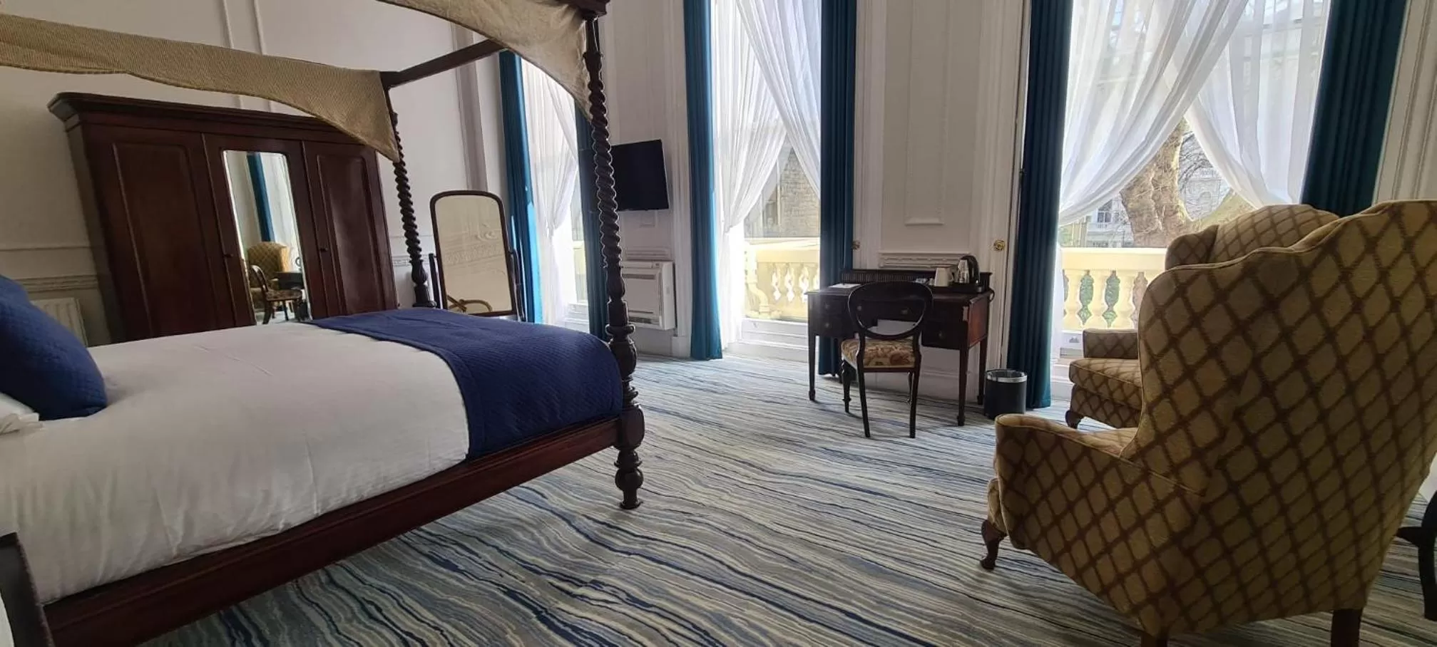 Bed in Commodore Hotel