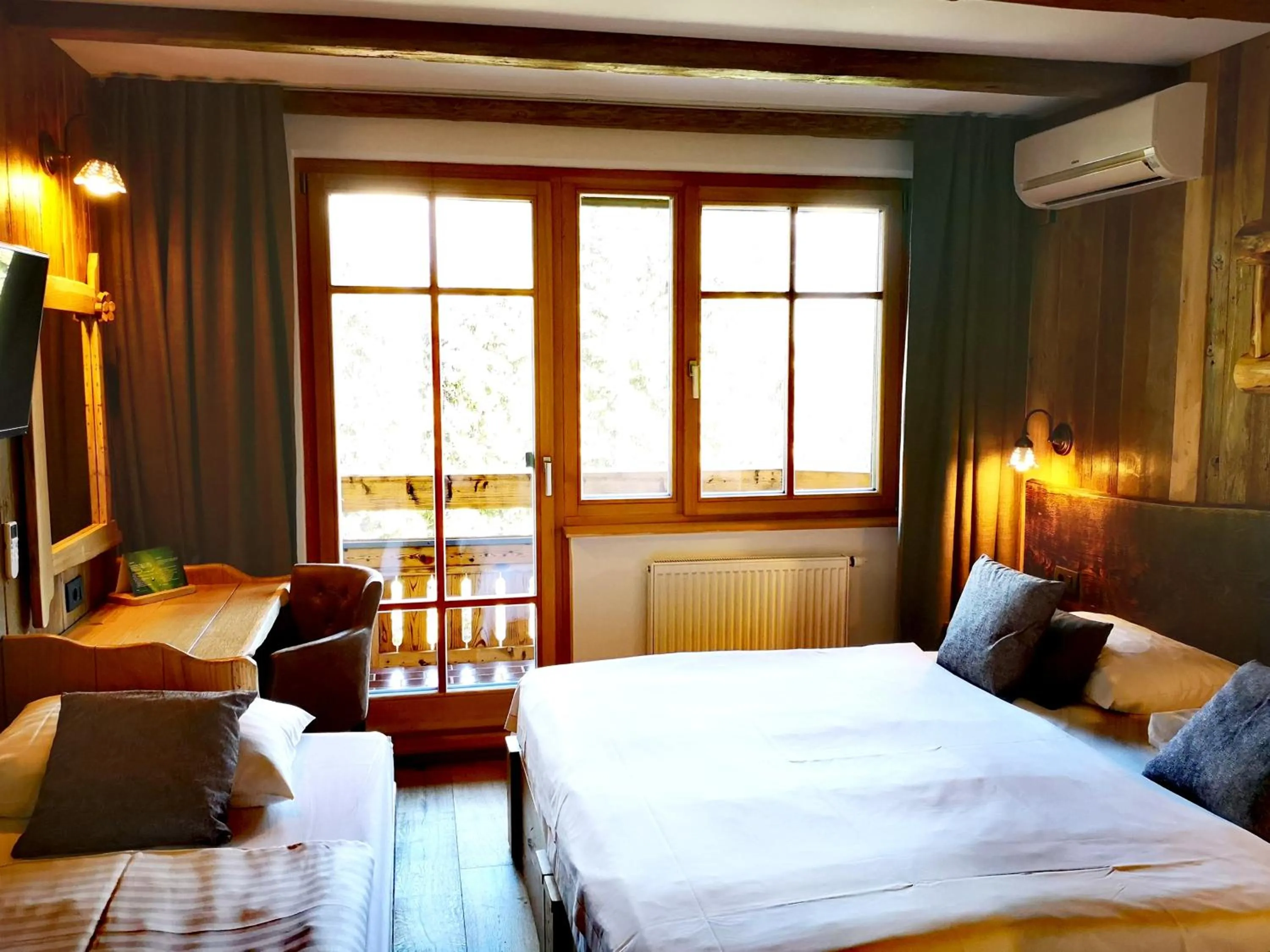 Bed in Ribno Alpine Hotel