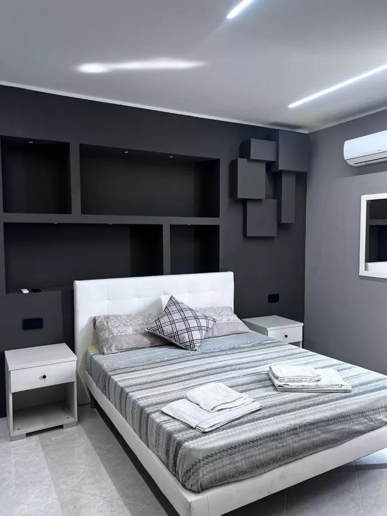 Bed in B&B Cleofà Paestum