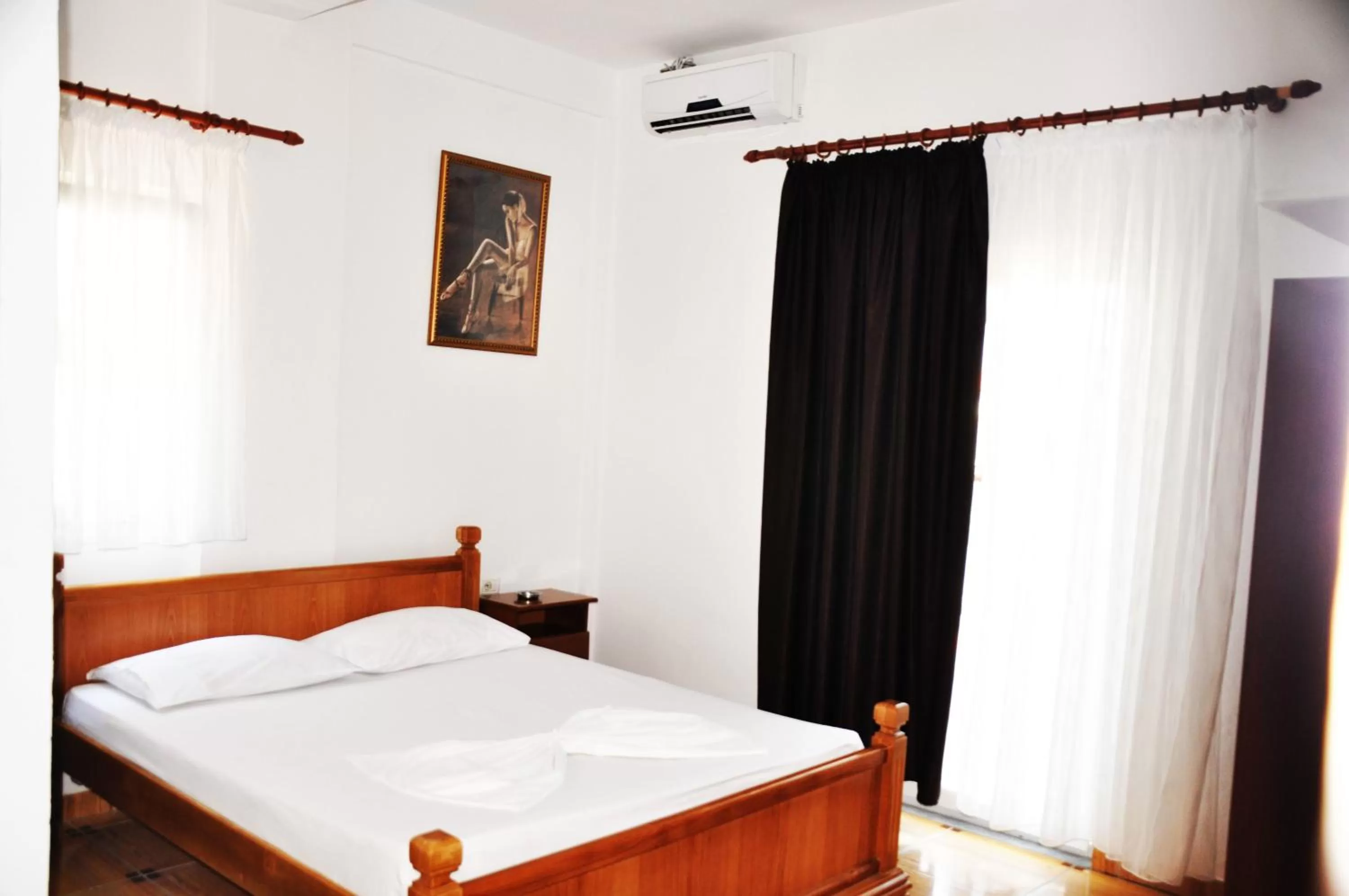 Photo of the whole room, Bed in Hotel Floga