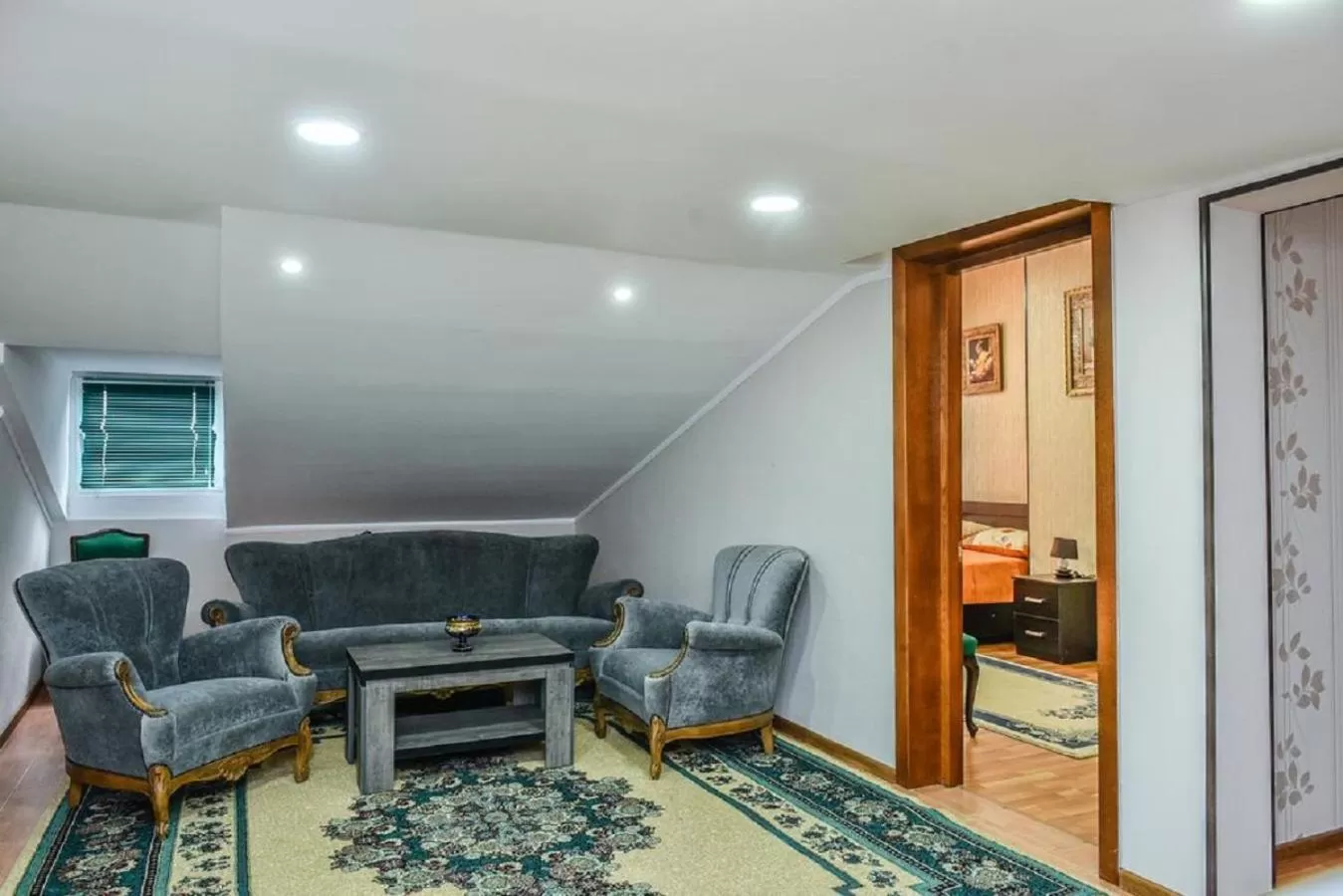 Communal lounge/ TV room, Seating Area in Hotel S.R