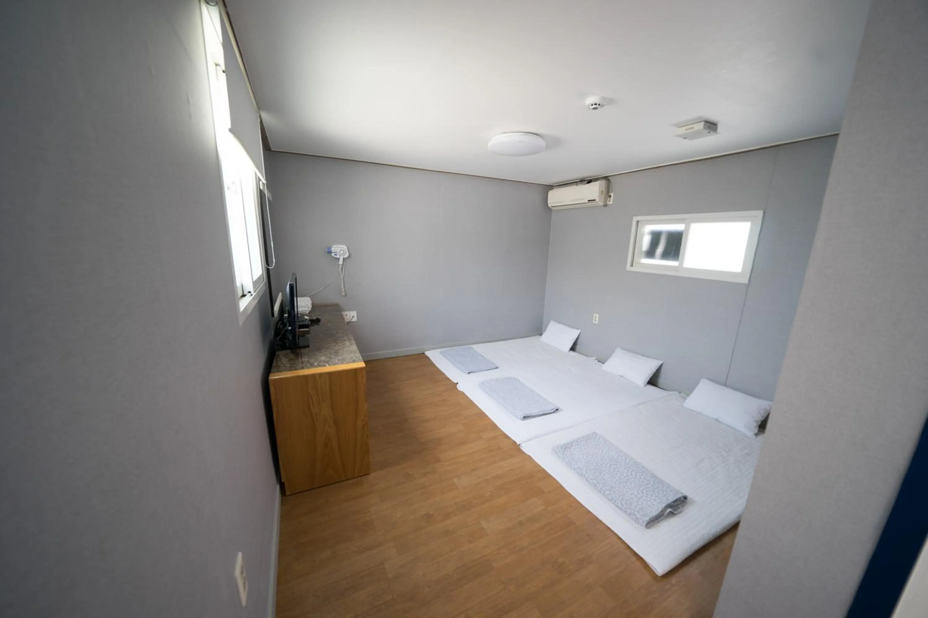 Bed in Beewon Guesthouse