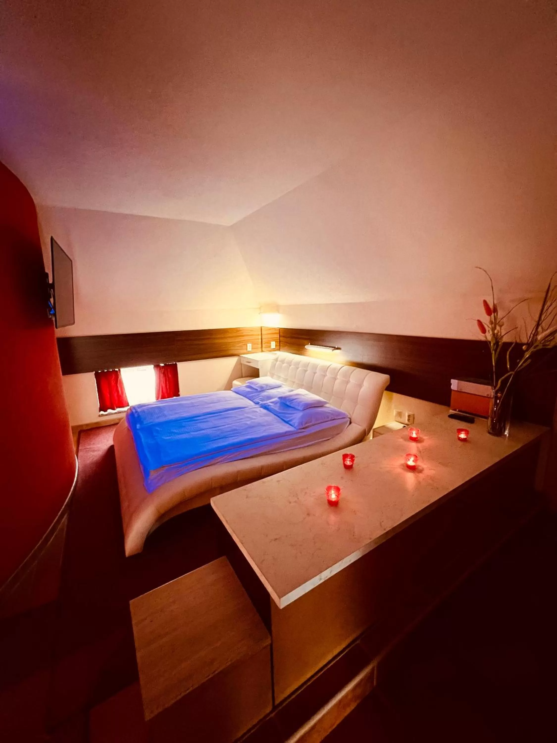 Bed in Spa & Wellness Hotel Orchidea