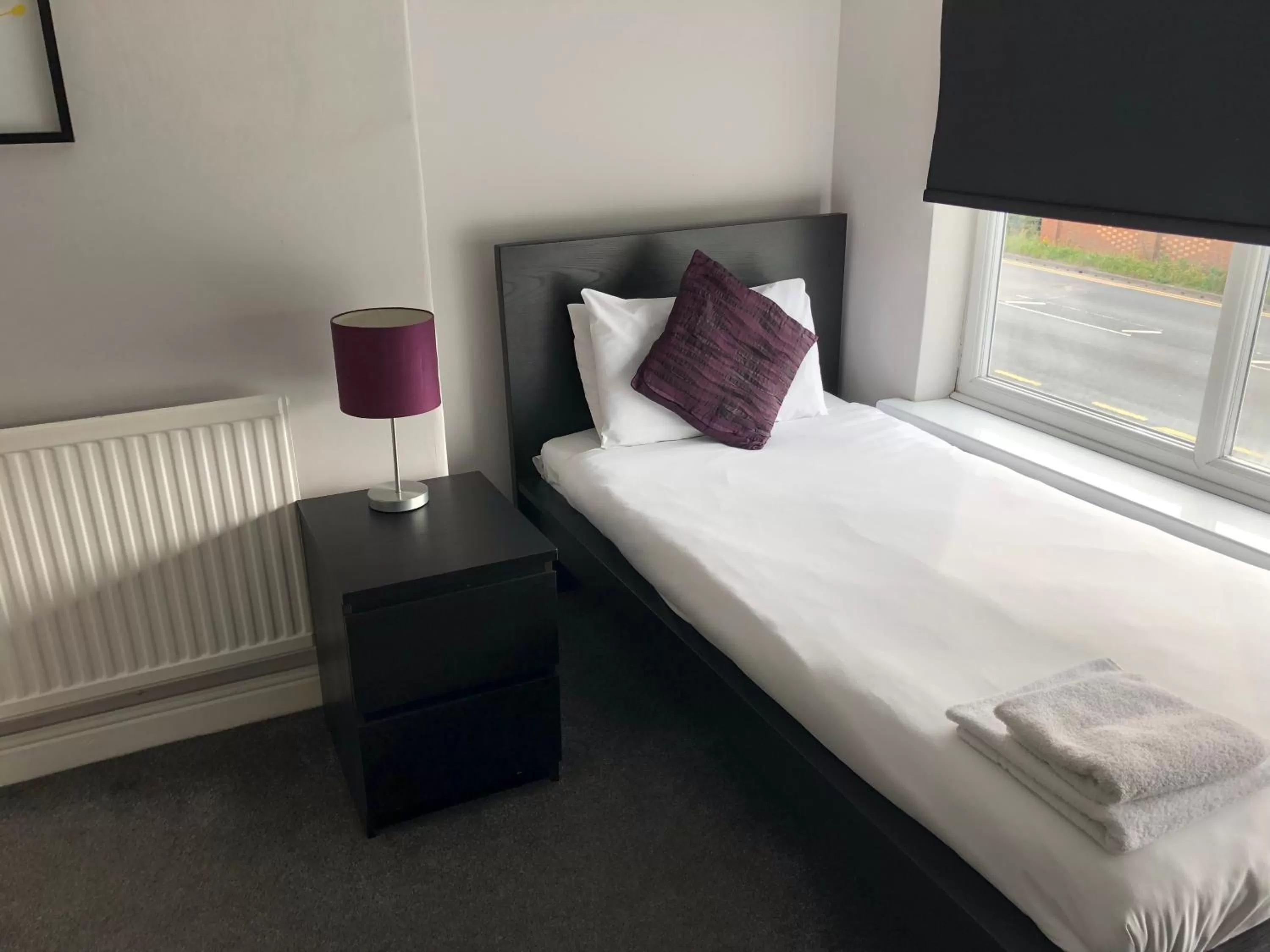 Bed in The Embassy Hotel