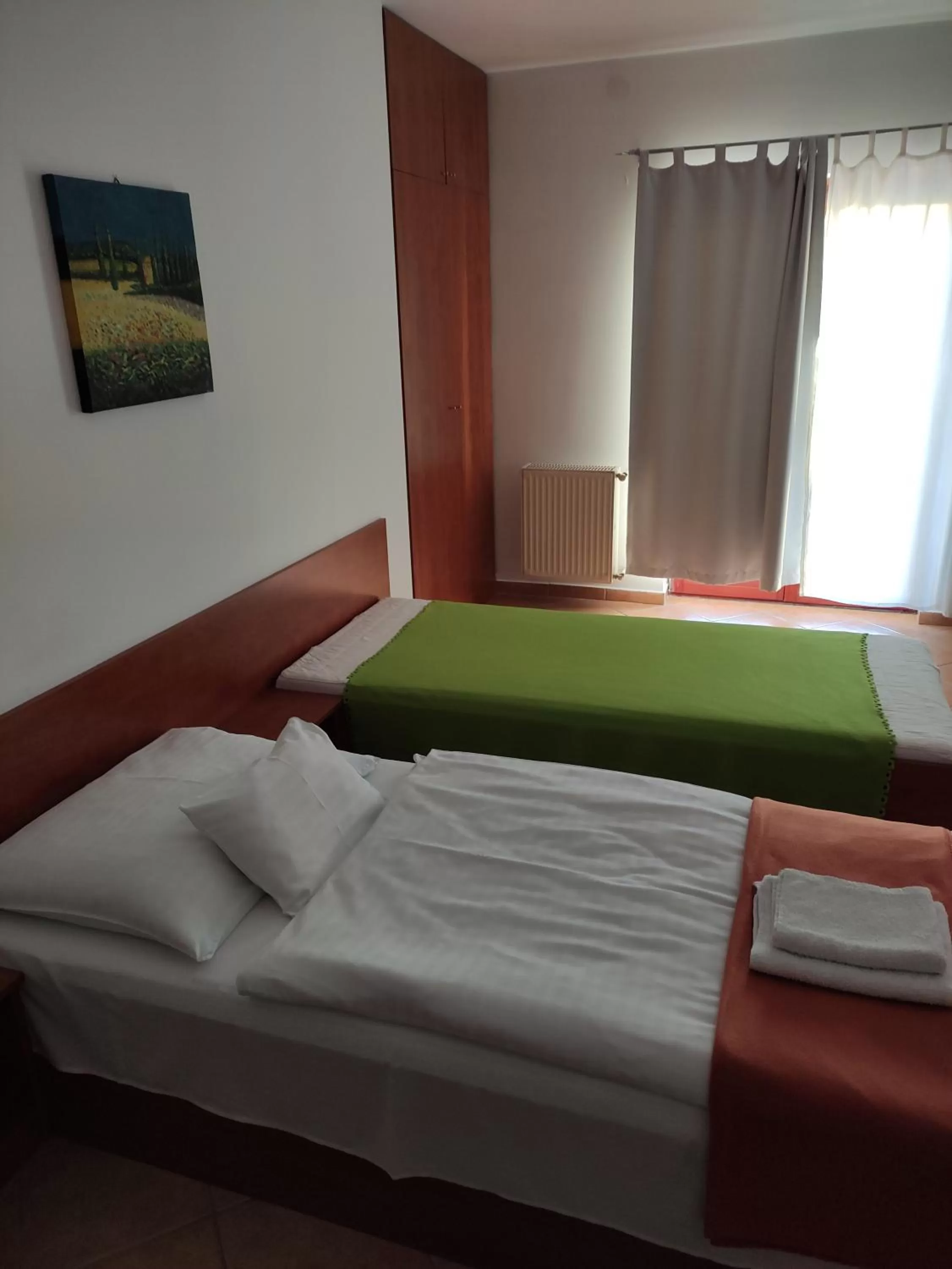 Bed in Szent Kristóf Apartmanhotel