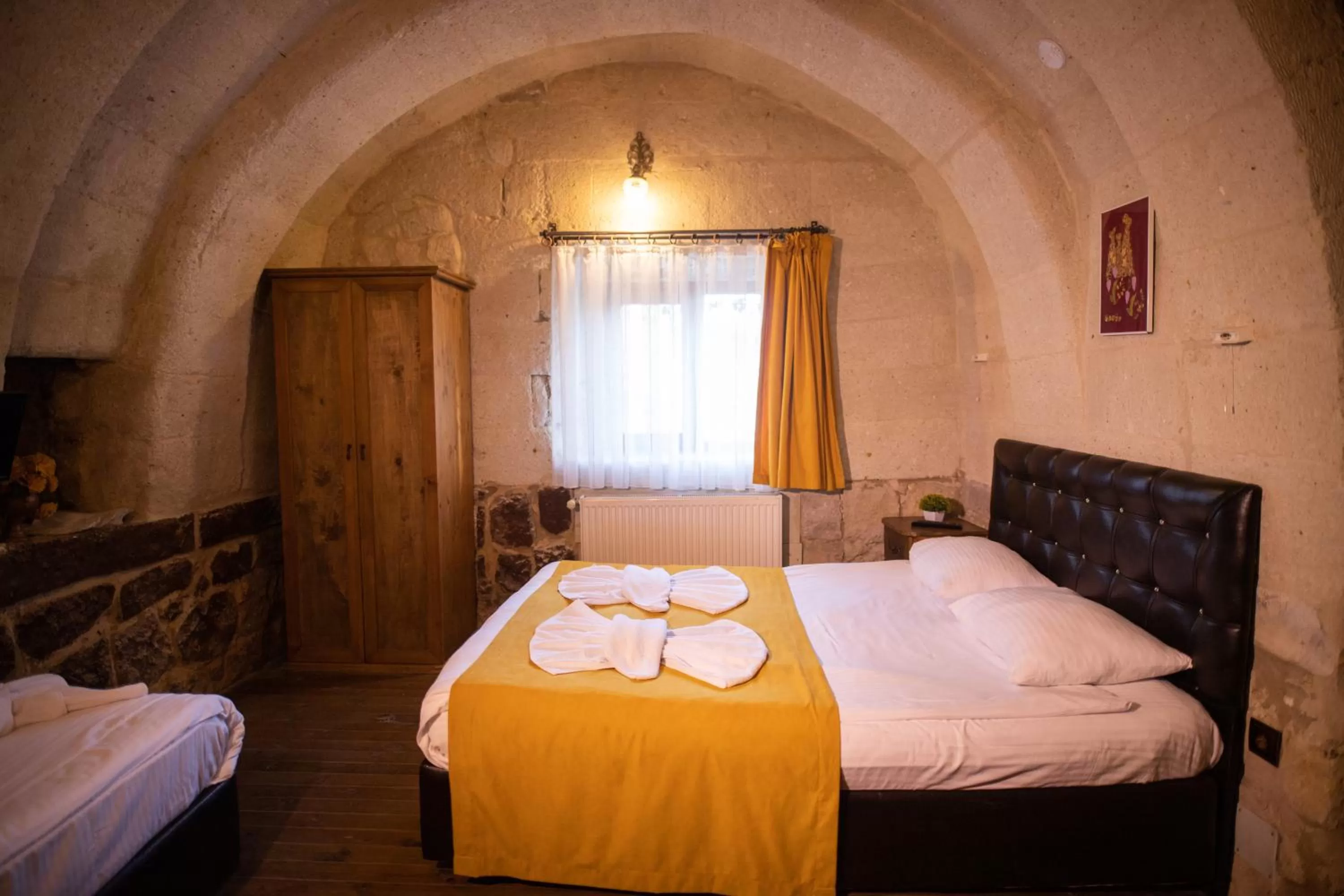 Bed in 7 Oda Kapadokya Cave Hotel