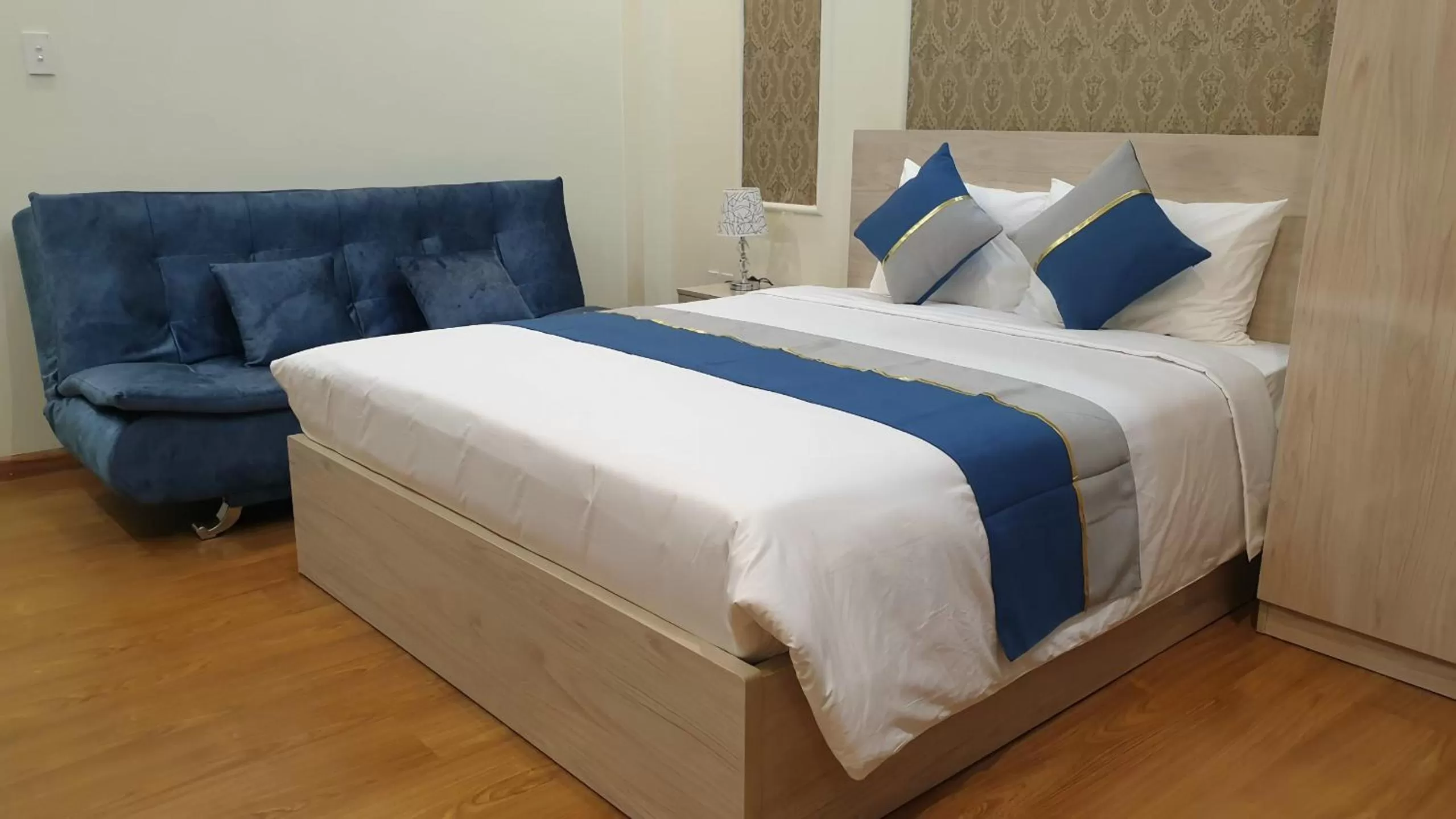 Bed in Chez Lotus Rose