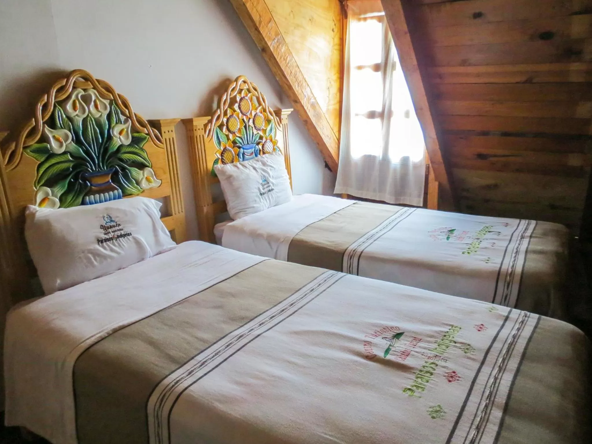 Bed in Cabañas Yunuén by Rotamundos