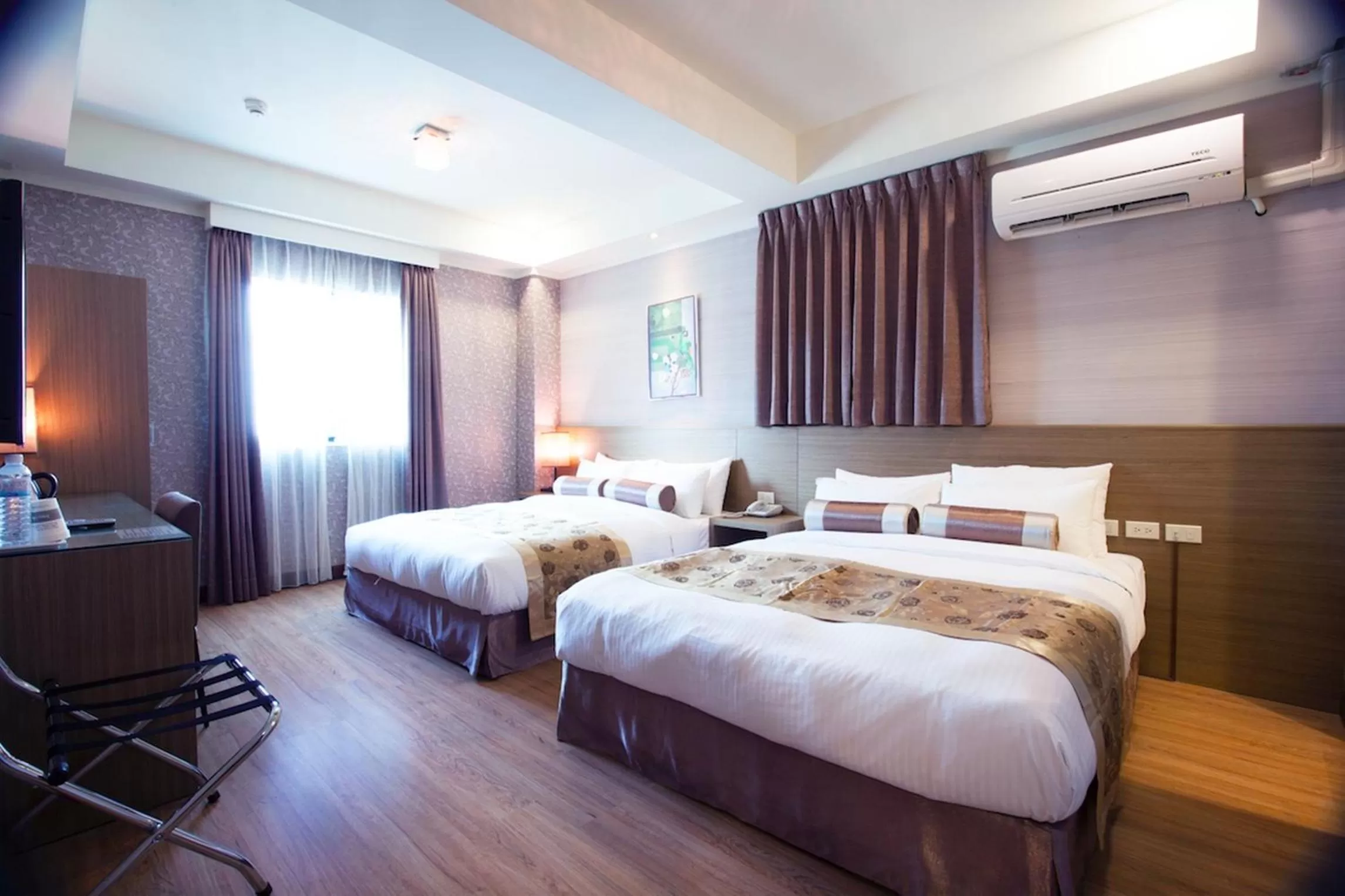 Bed in True Friend Hotel