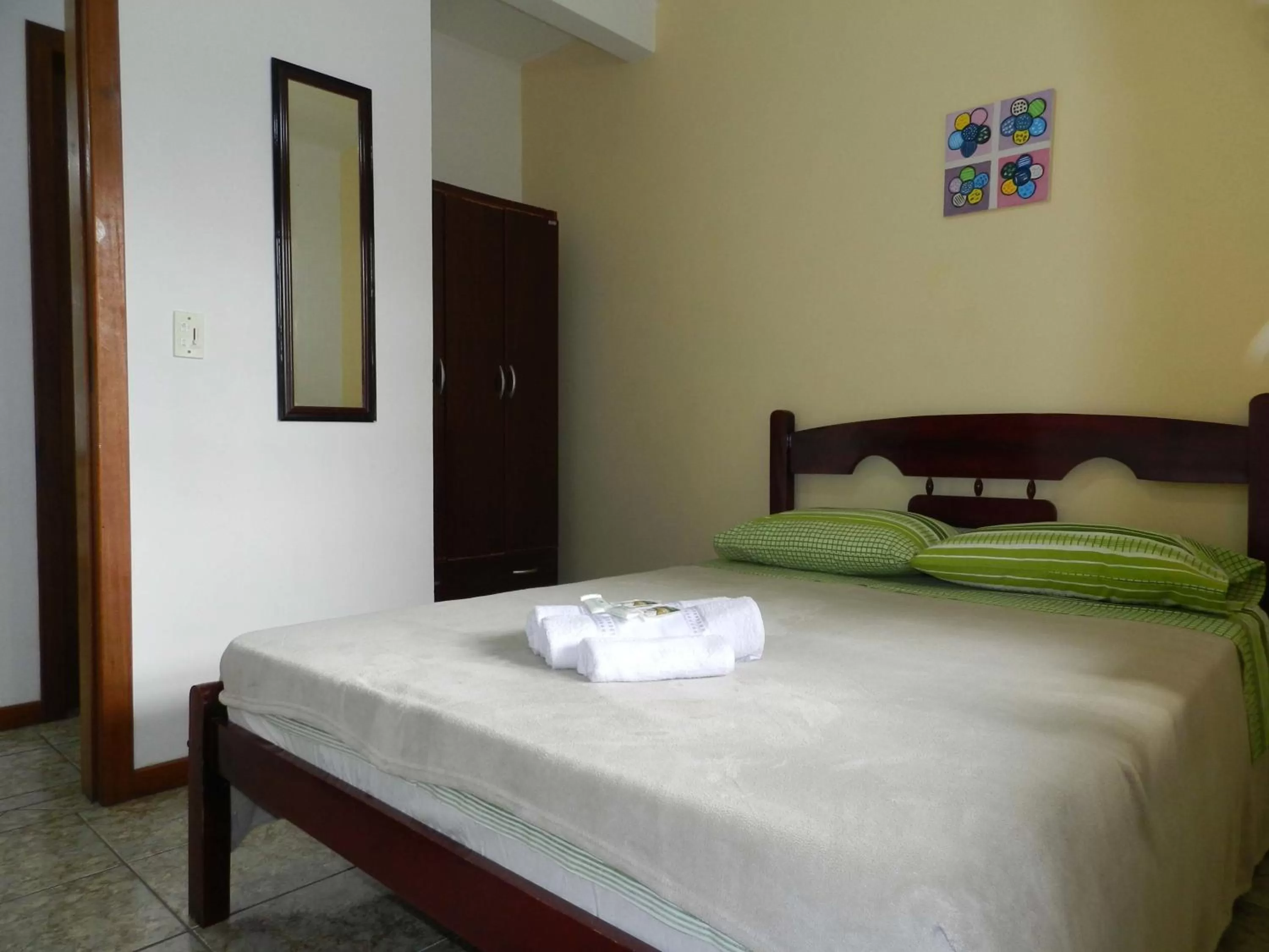 Bed in Pousada Baleia Franca Canasvieiras