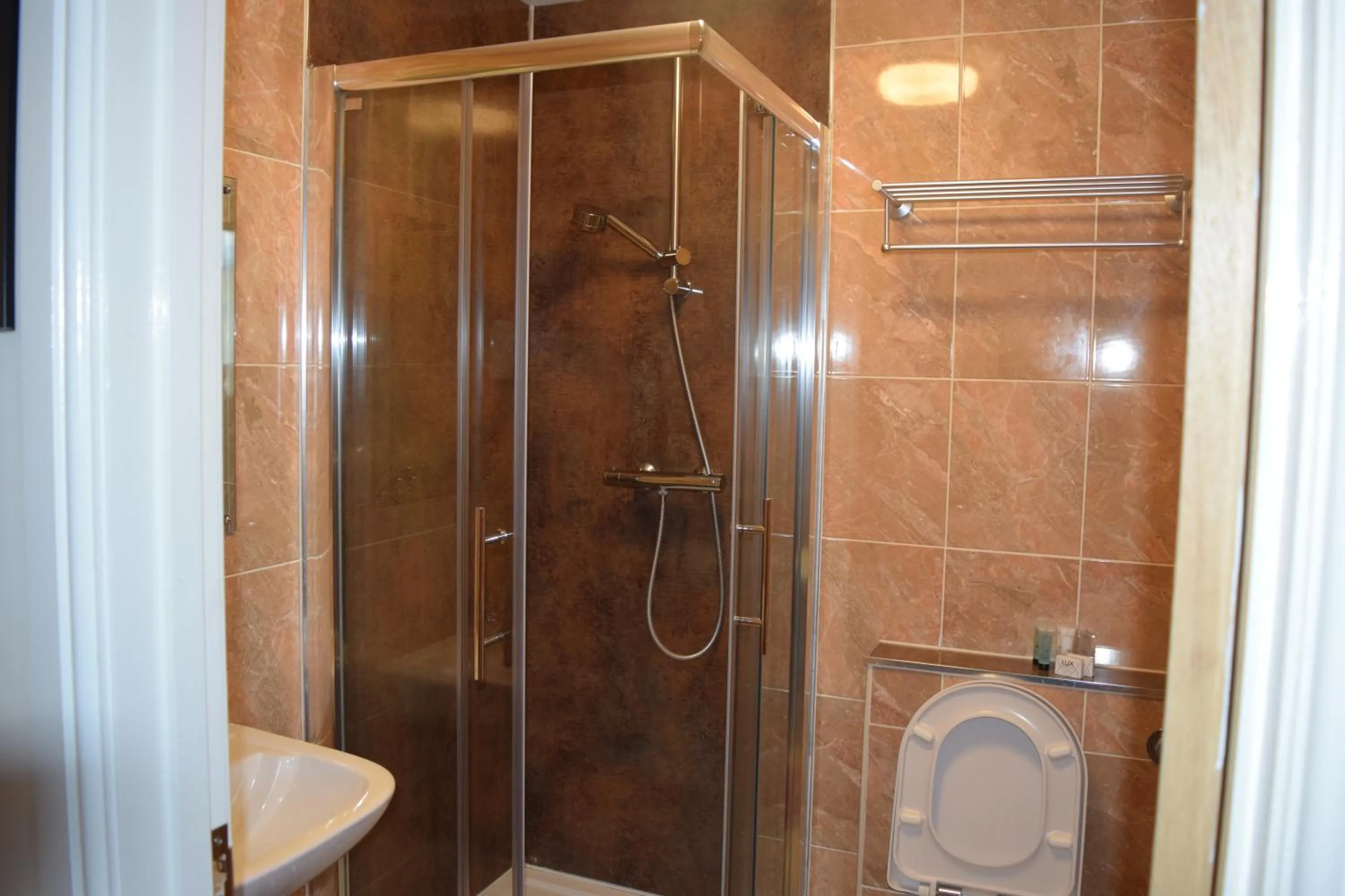 Shower in Star Anglia Hotel City Center by OYO