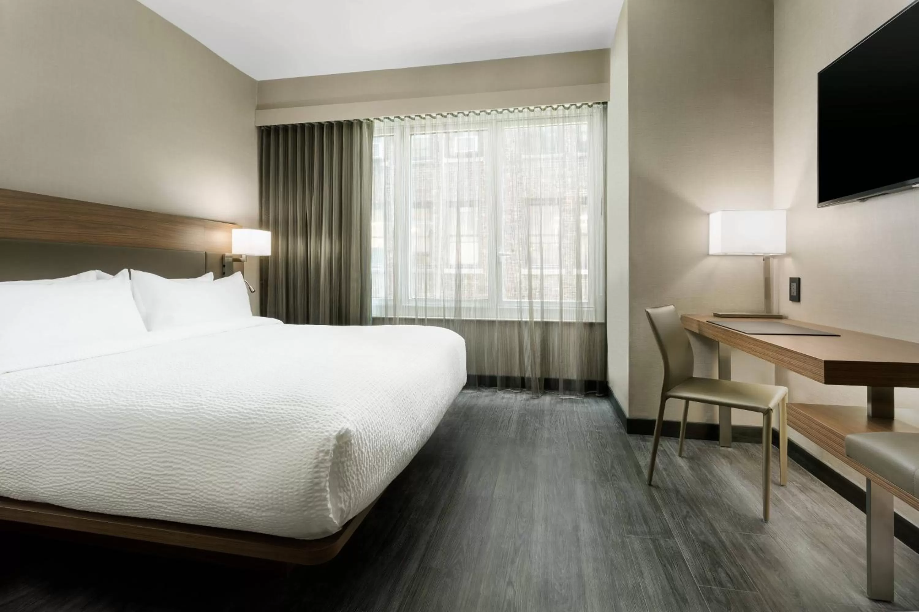 Photo of the whole room, Bed in AC Hotel by Marriott New York Times Square
