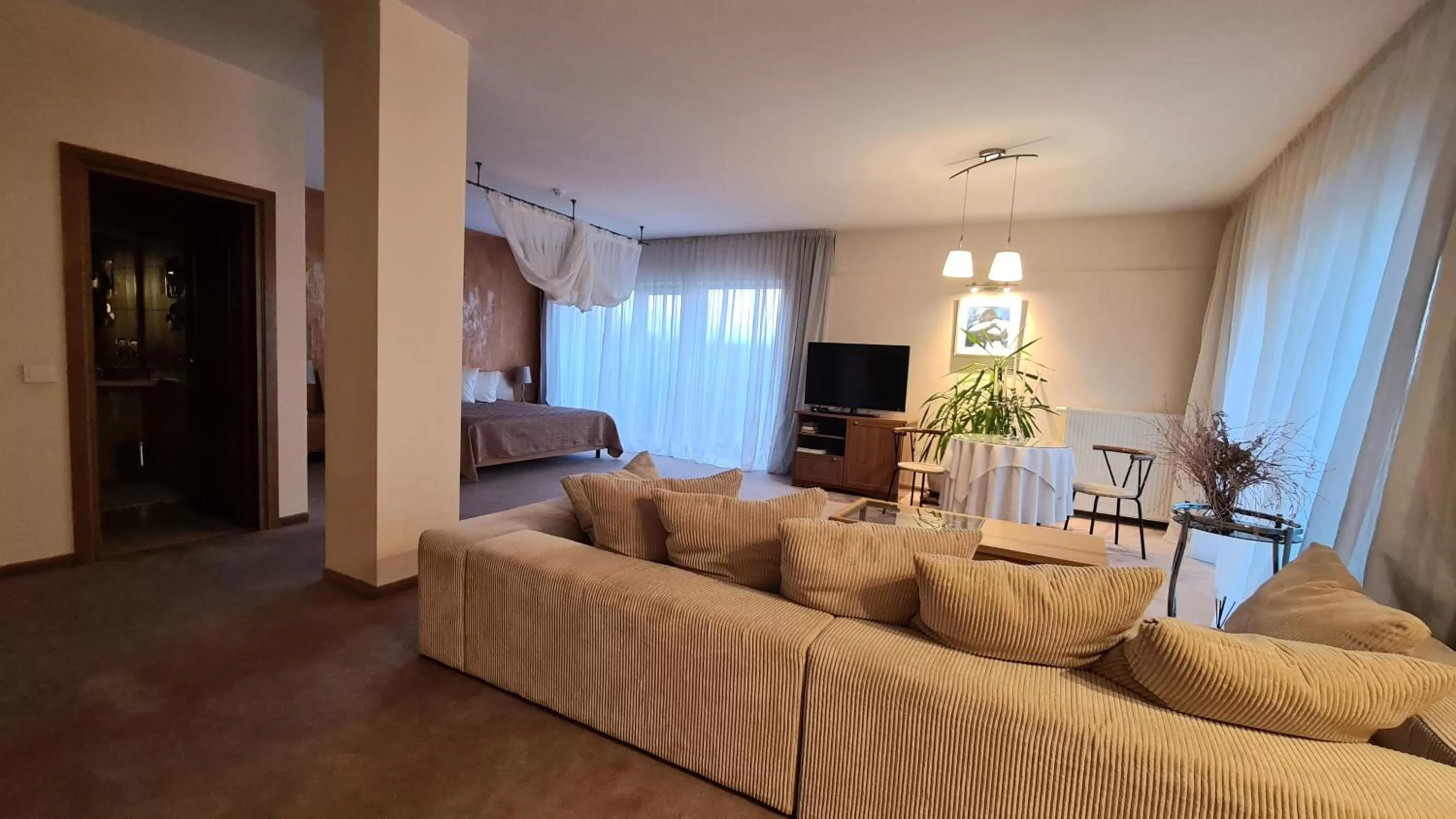 Communal lounge/ TV room in Romantic Boutique Hotel & Spa