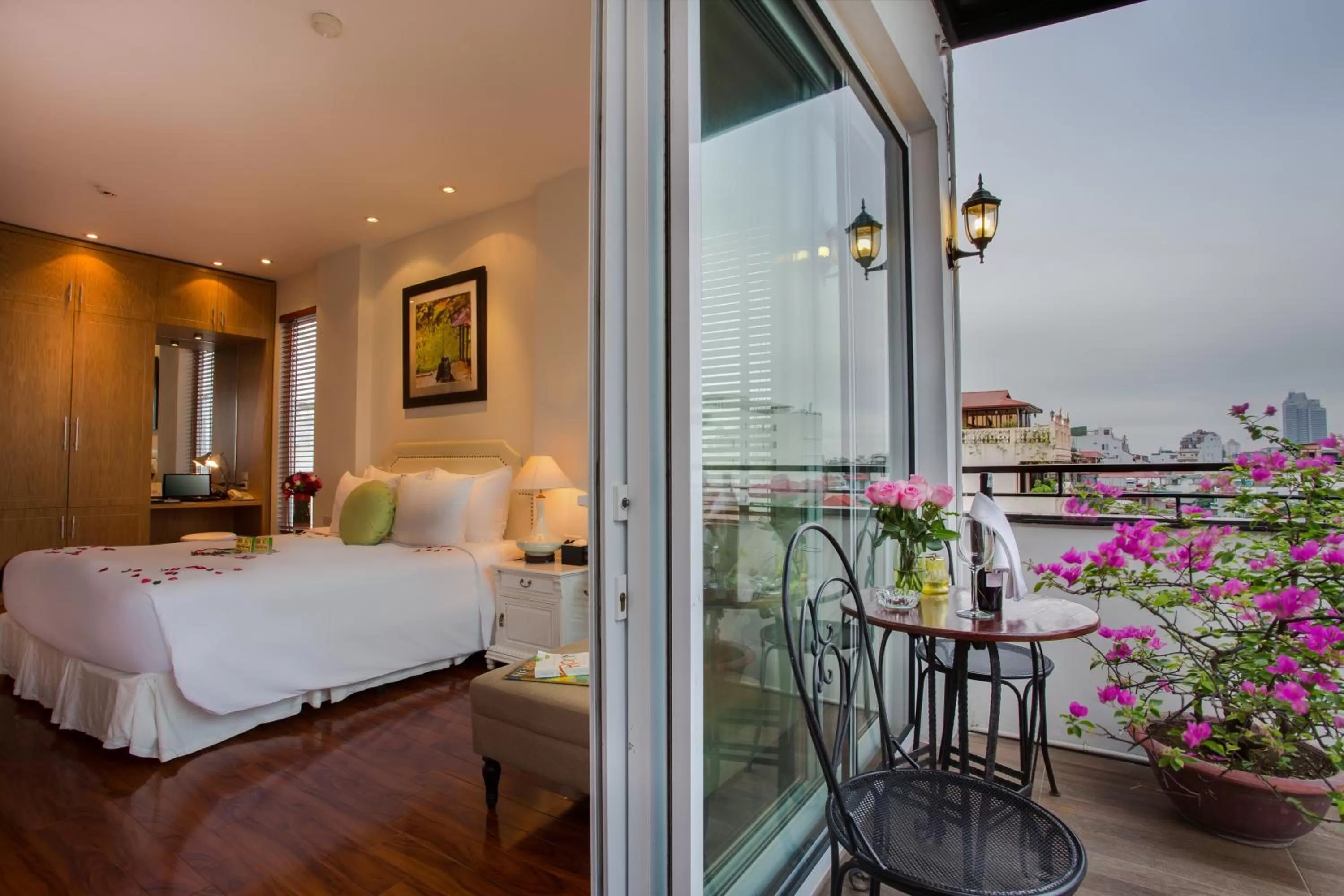 Balcony/Terrace, Bed in Mercury Central Hotel Hanoi