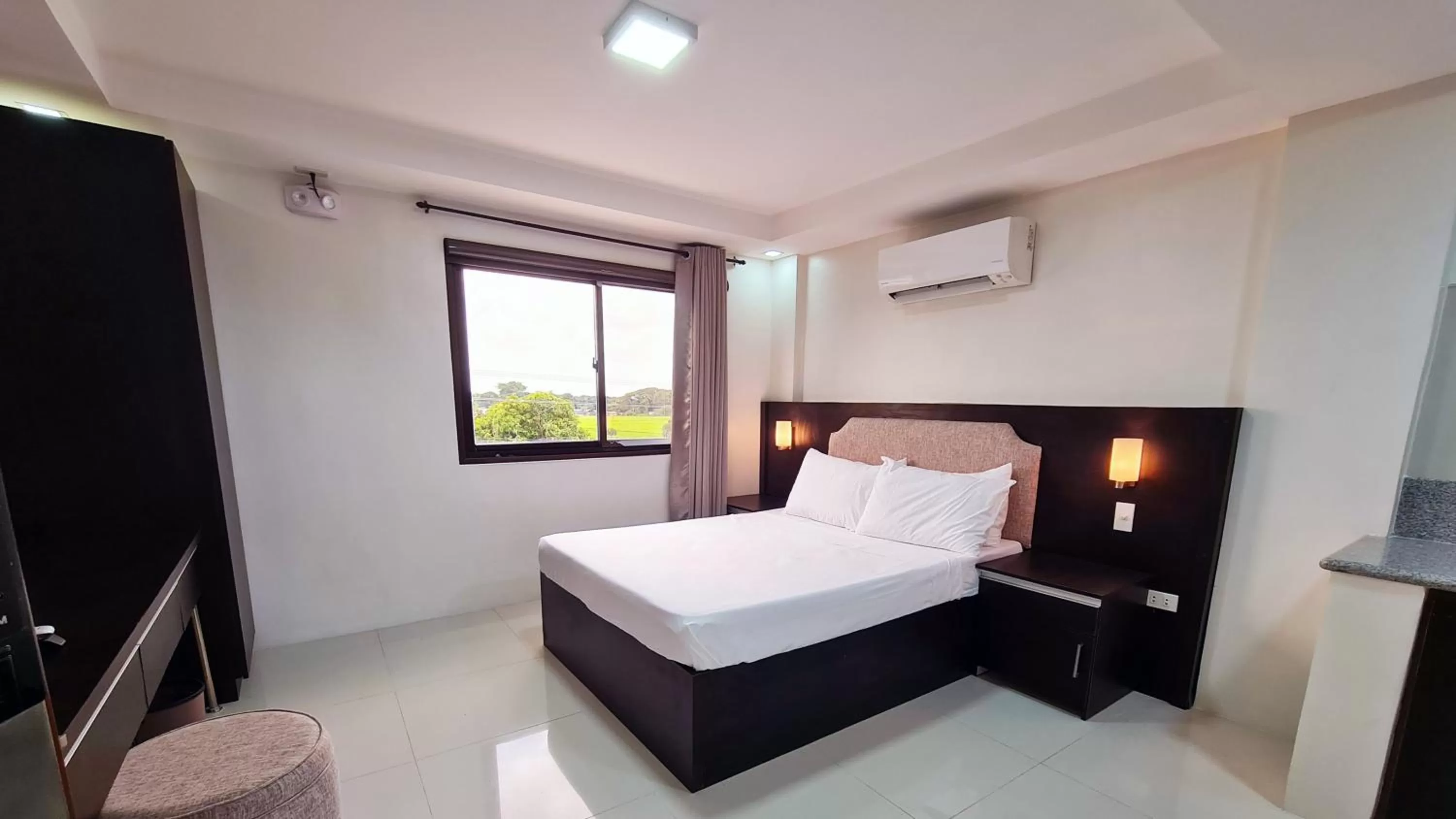 Bed in Staycation Hotel