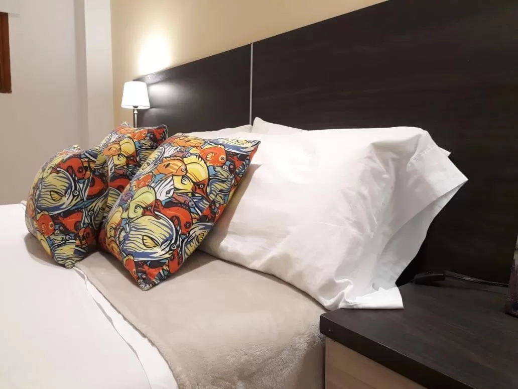 Bed in Porto Bello Hotel Boutique