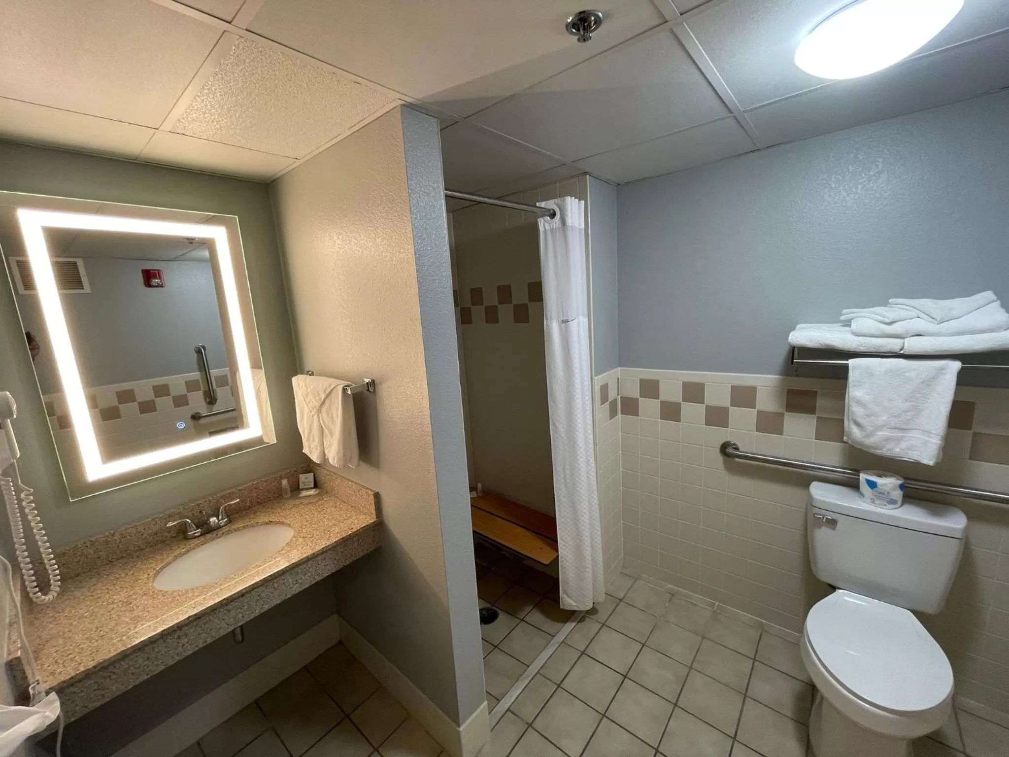 Bathroom in AmericInn by Wyndham Sayre