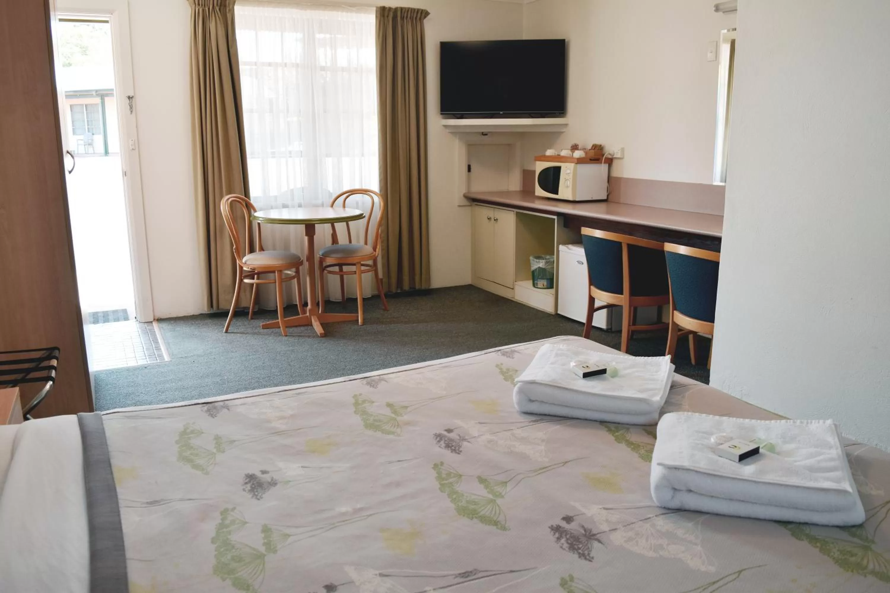 Bed in Ten Dollar Town Motel