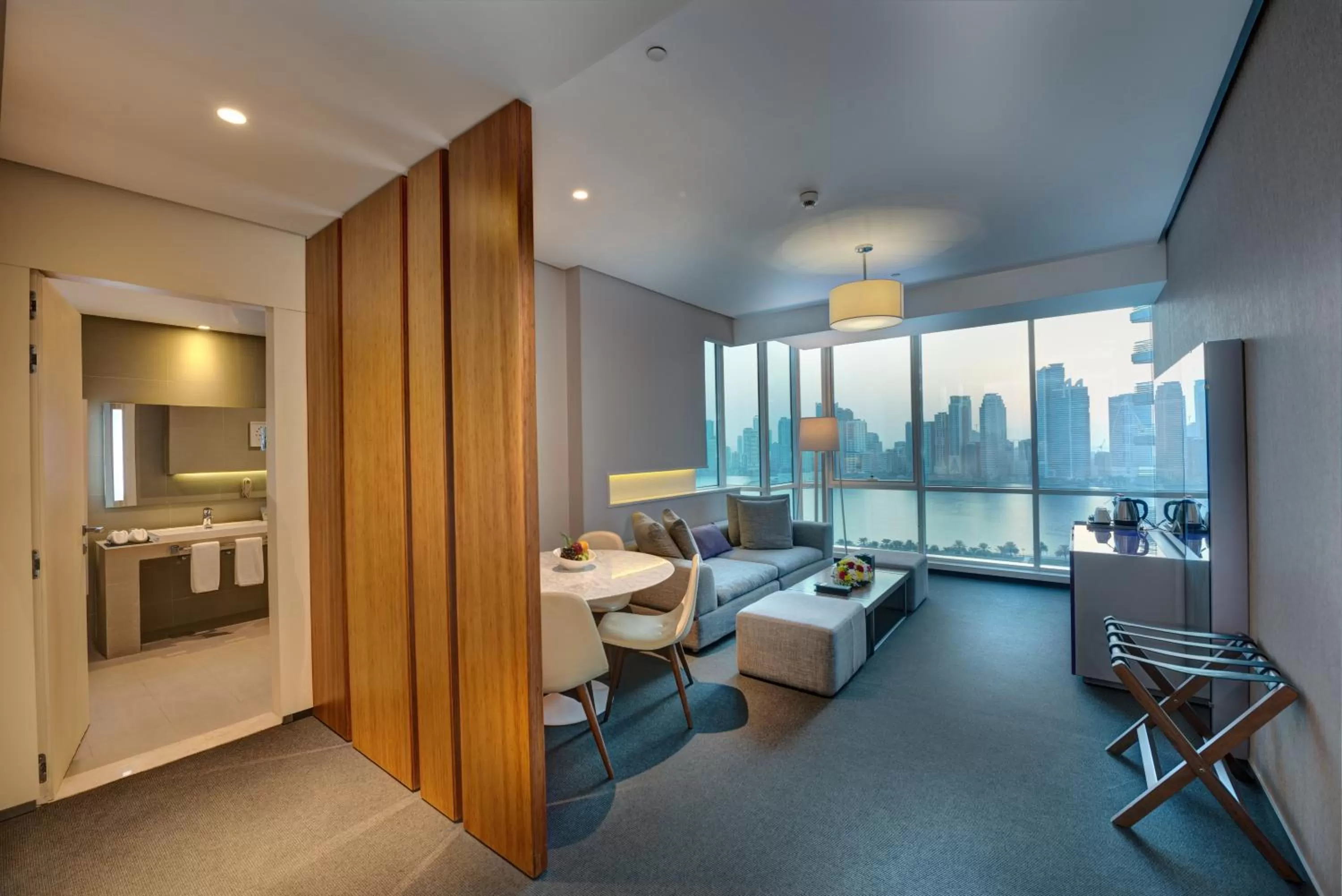 Living room, Bed in The Act Hotel Sharjah